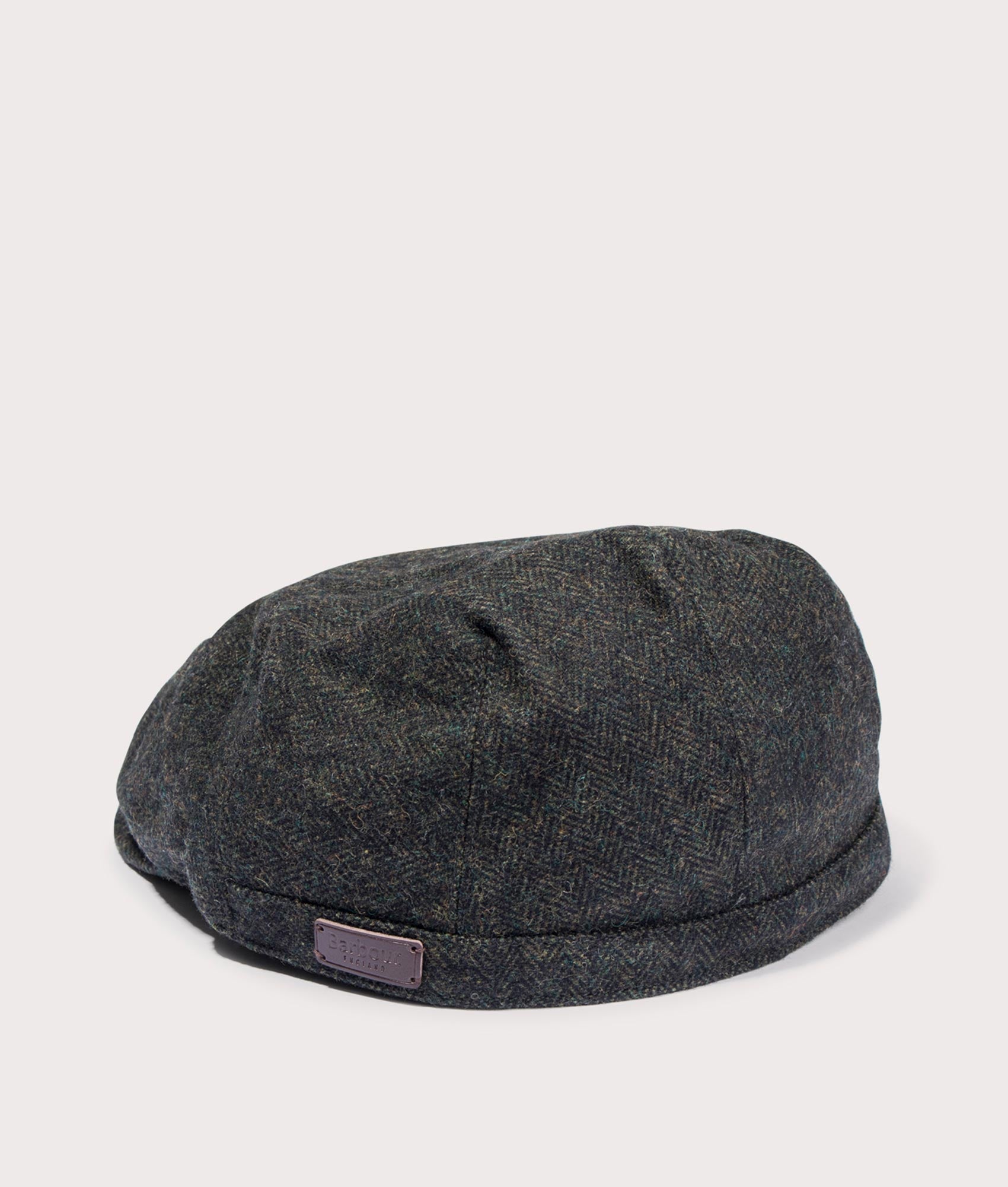 Barbour Lifestyle Barlow Flat Cap in Olive at EQVVS Menswear. Angled back shot.