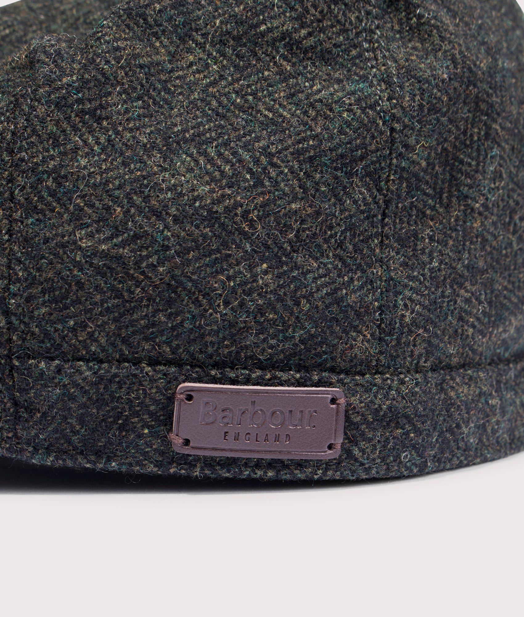 Barbour Lifestyle Barlow Flat Cap in Olive at EQVVS Menswear. Detail shot.