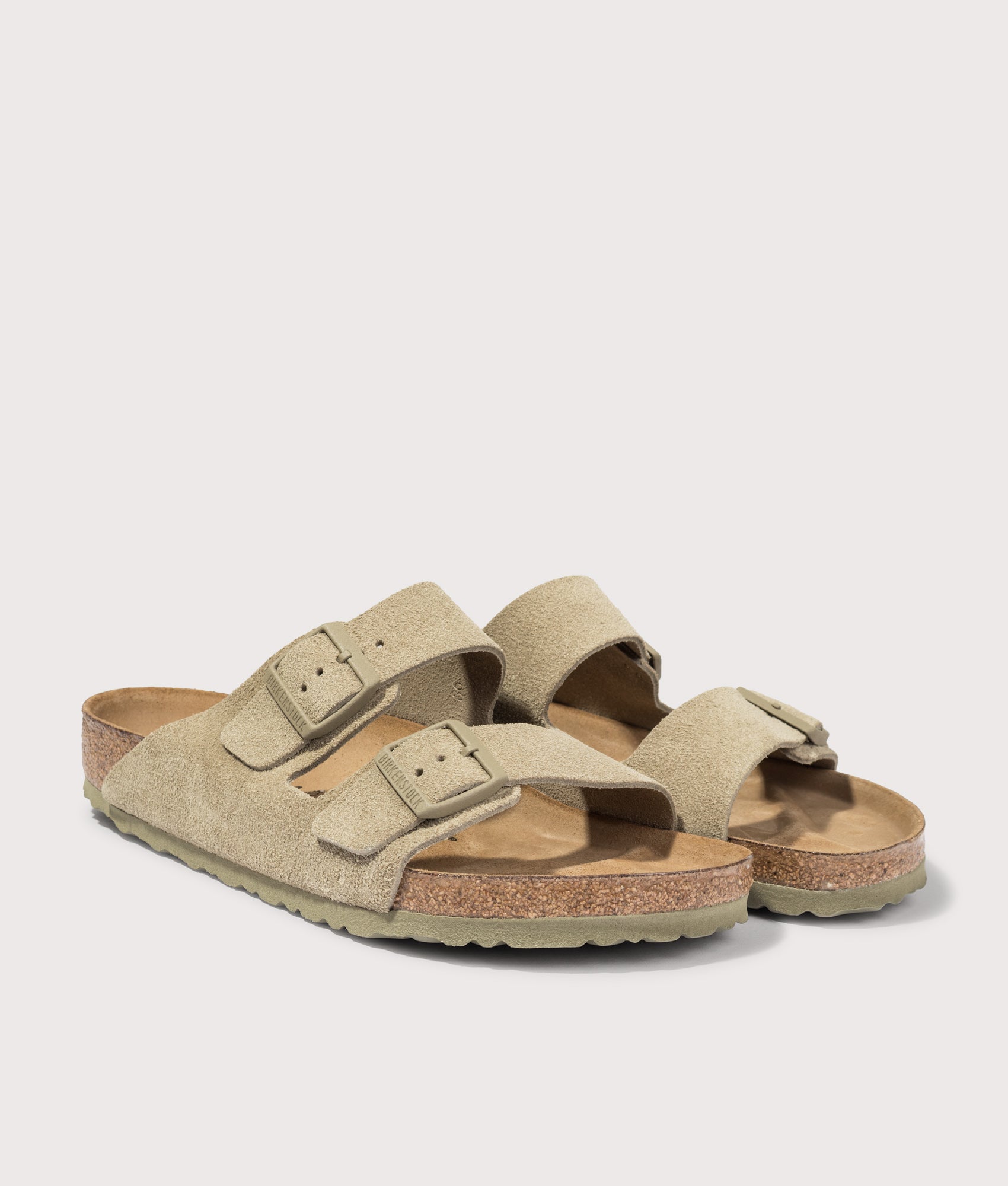 Arizona Suede Leather Sandals in Faded Khaki by BIRKENSTOCK. Shot by EQVVS. Front angled shot. 