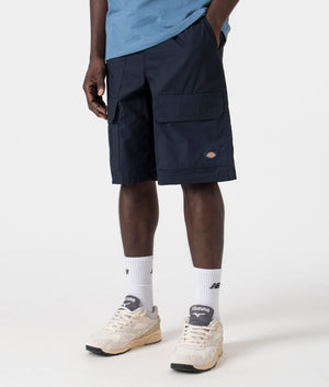 Dickies Fishersville Cargo Shorts in Dark Navy. Front side angle shot at EQVVS.