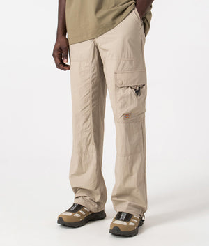 Dickies Jackson Cargo Pants in Sandstone. Side angle shot at EQVVS.