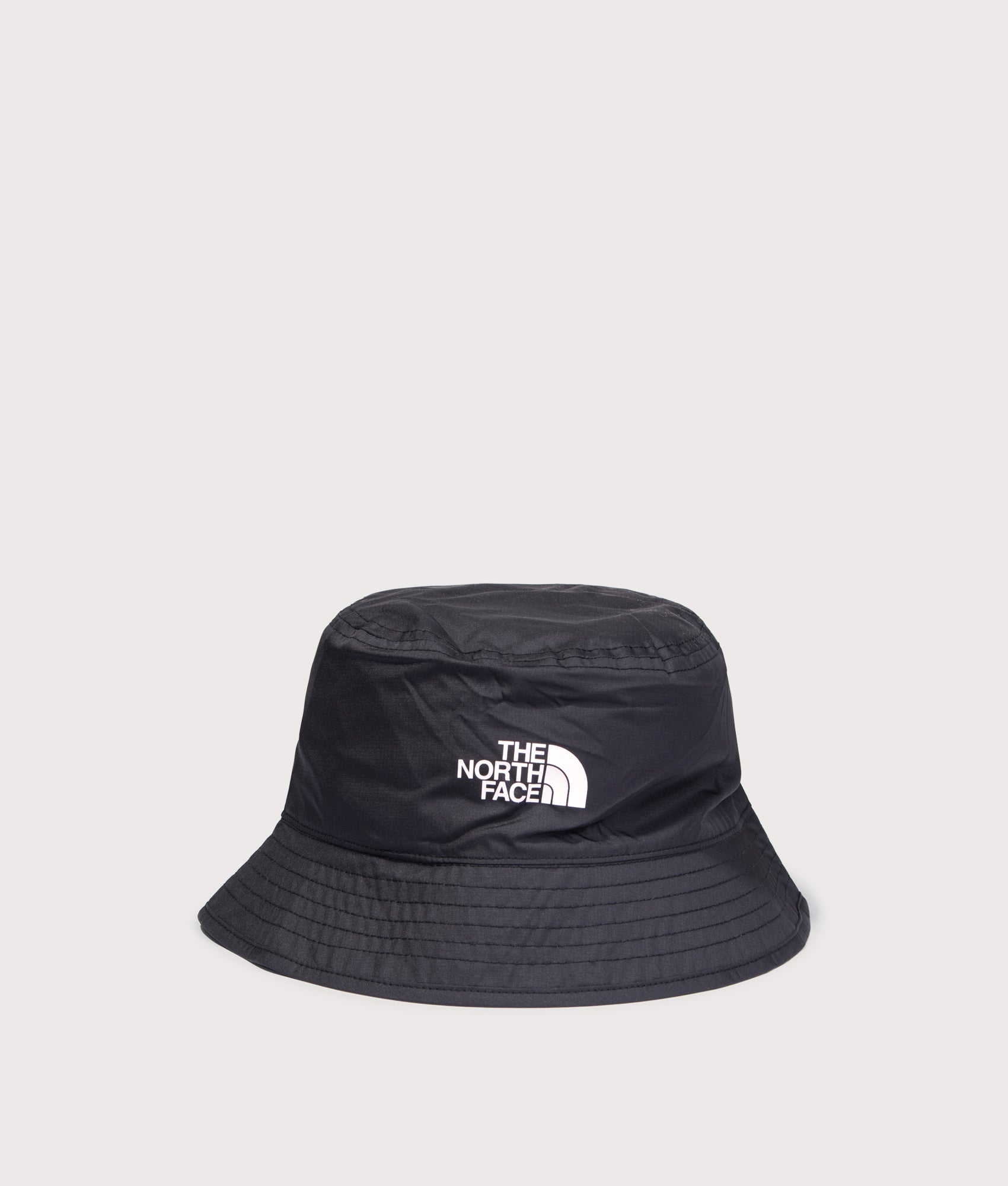 Stash Reversible Bucket Hat in TNF Black/TNF White by The North Face. Shot by EQVVS. Front shot.