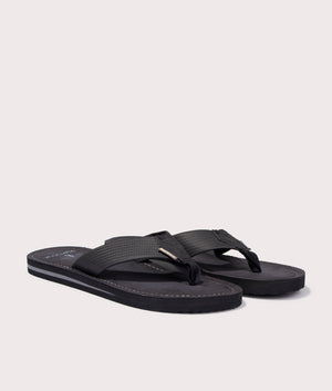 Barbour Toeman Beach Sandals in Black Angle Shot at EQVVS
