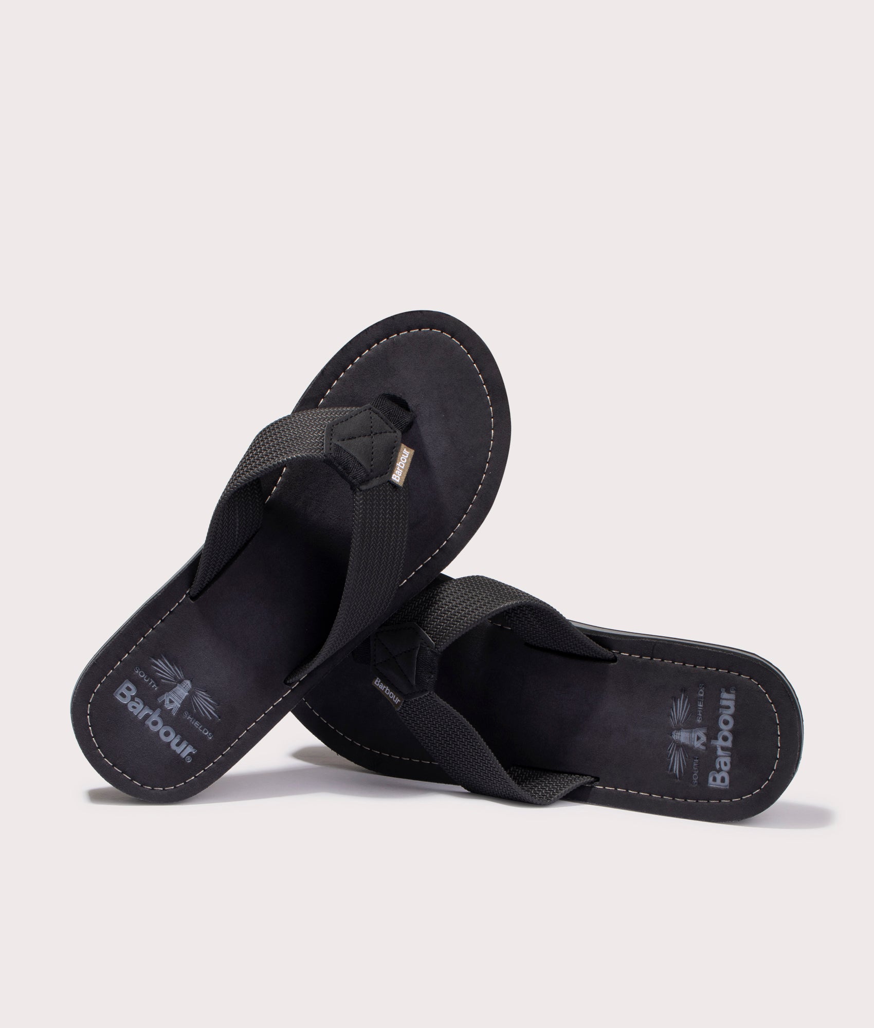 Barbour Toeman Beach Sandals in Black Upper  Shot at EQVVS