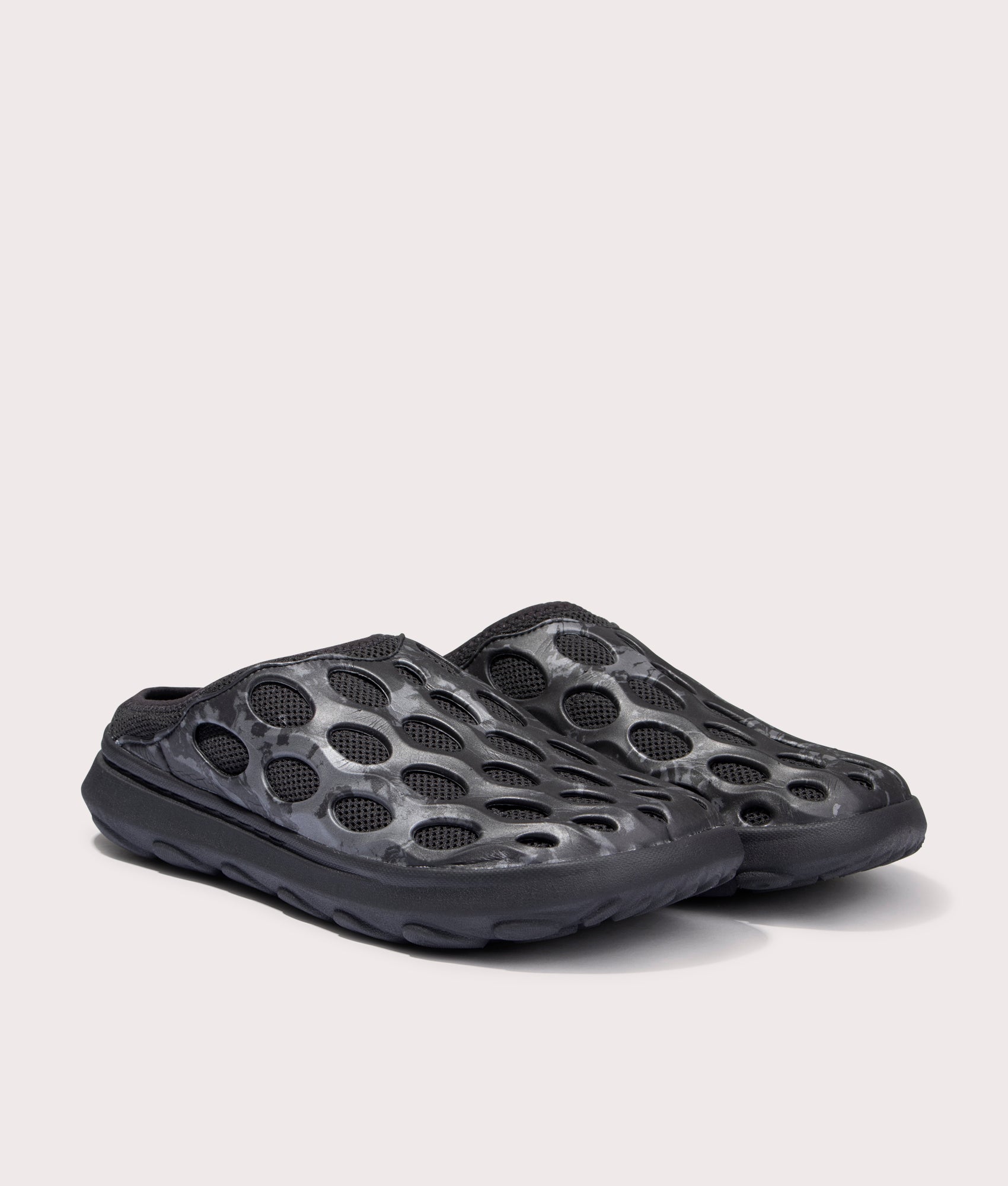 Hydro Mule SE in Black by Merrell. EQVVS side angle pair shot