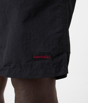 Gramicci Nylon Packable G-Shorts in Black. Side detail shot at EQVVS.