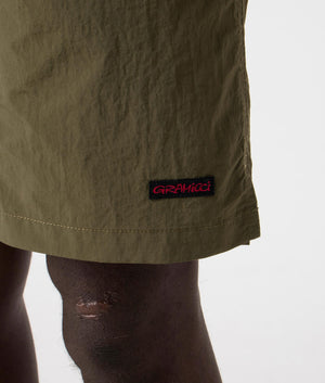 Gramicci Nylon Packable G-Shorts in Deep Olive. Side detail shot at EQVVS.
