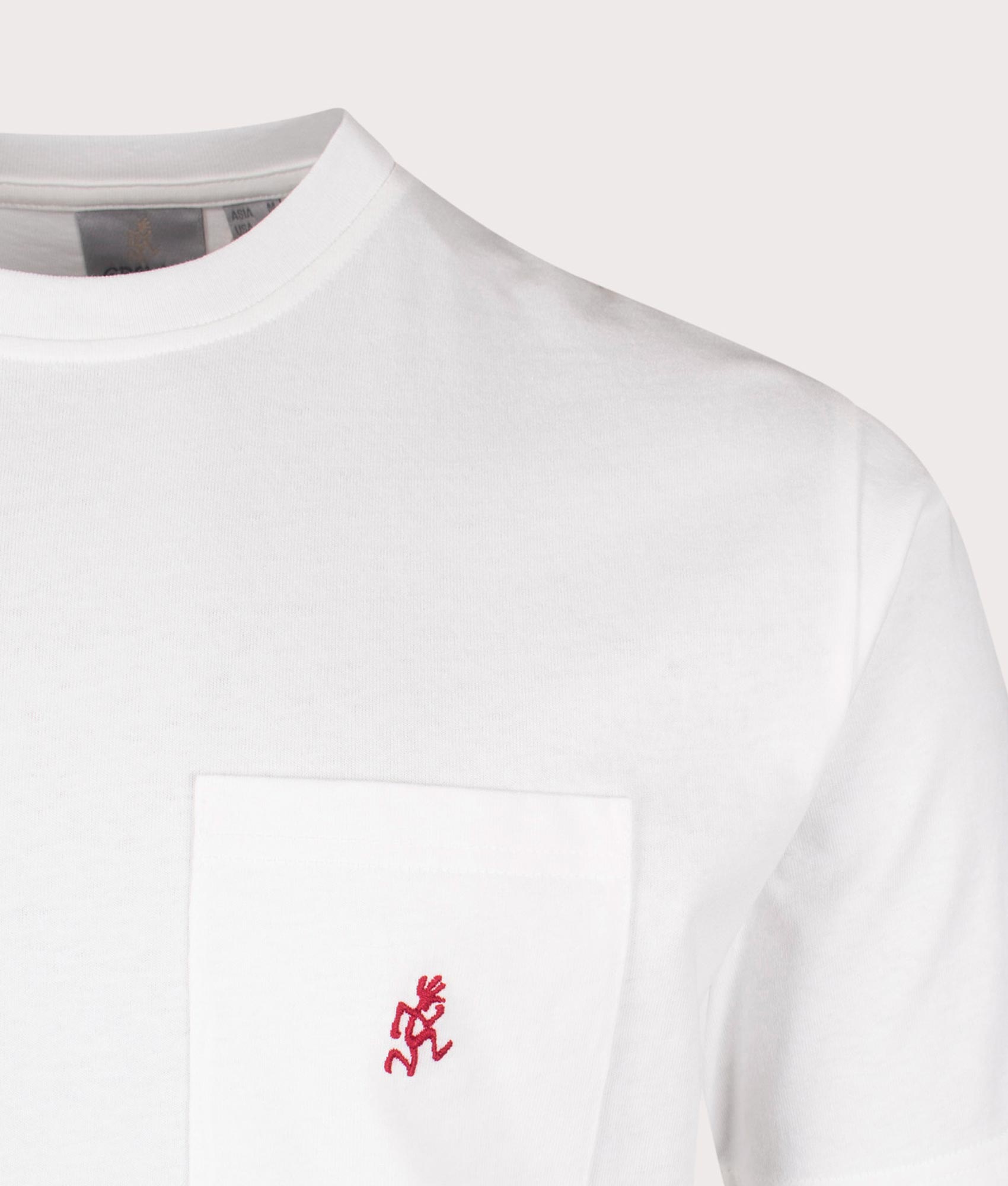 Gramicci One Point Tee in White at EQVVS Menswear. Detail shot.