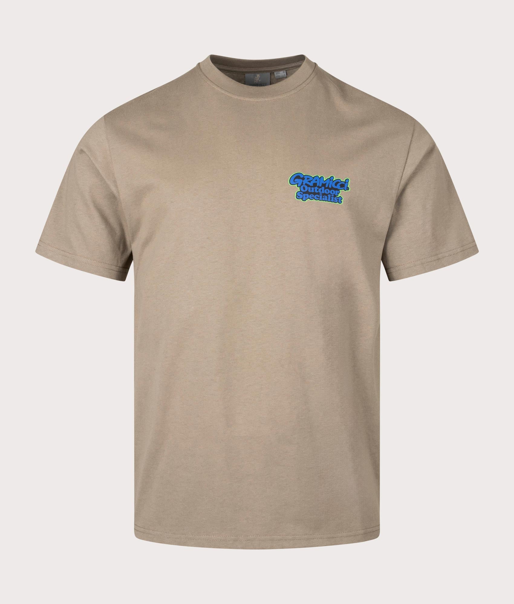 Gramicci Outdoor Specialist T-Shirt in Cayote. Front angle shot at EQVVS.