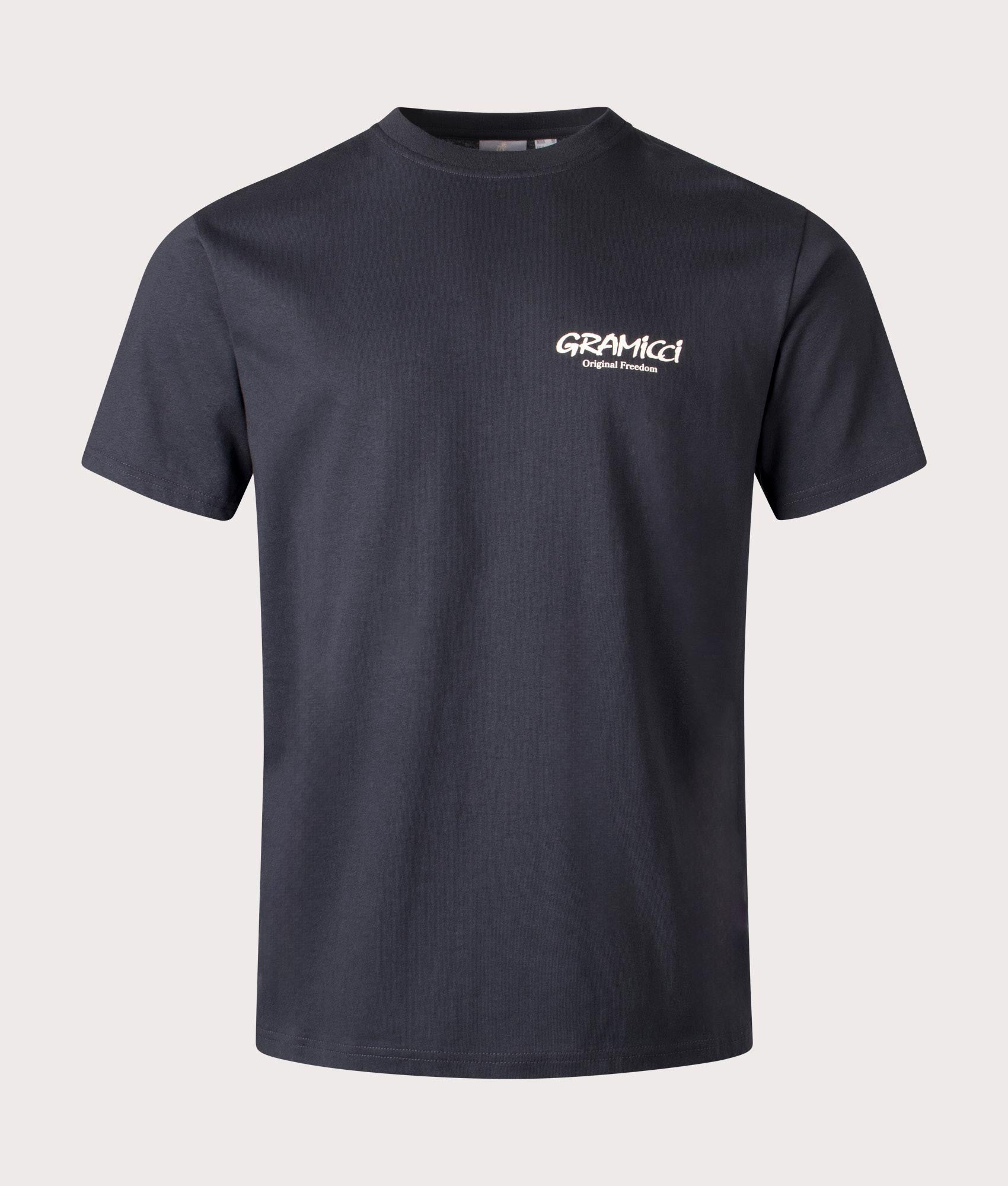 Gramicci Original Freedom T-shirt in Vintage black with front and back graphics, 100% organic cotton at EQVVS menswear. Front shot. 