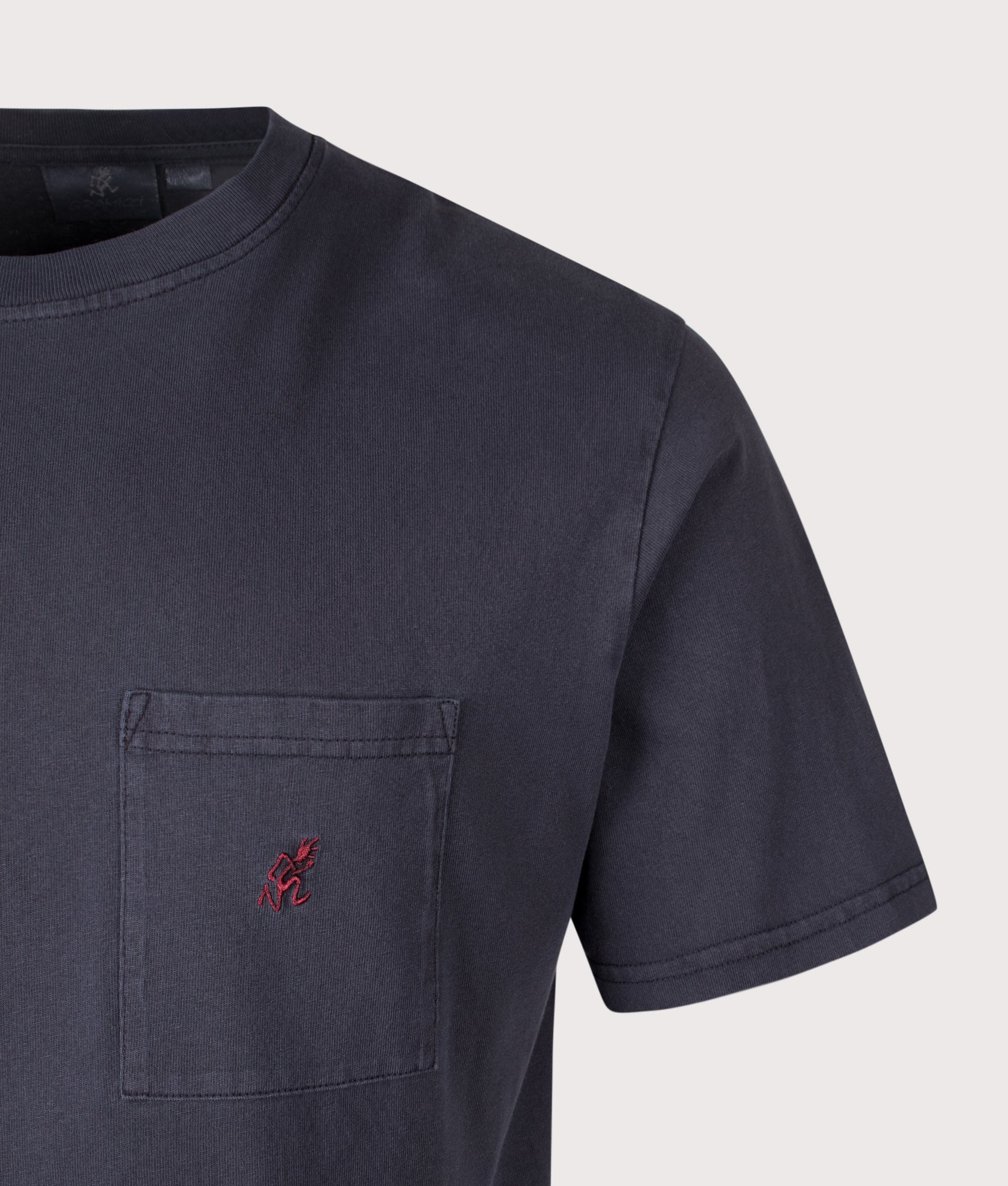 One Point Pigment Dyed T-Shirt in Navy Pigment | 100% Cotton | Gramicci | EQVVS | Front detail shot 