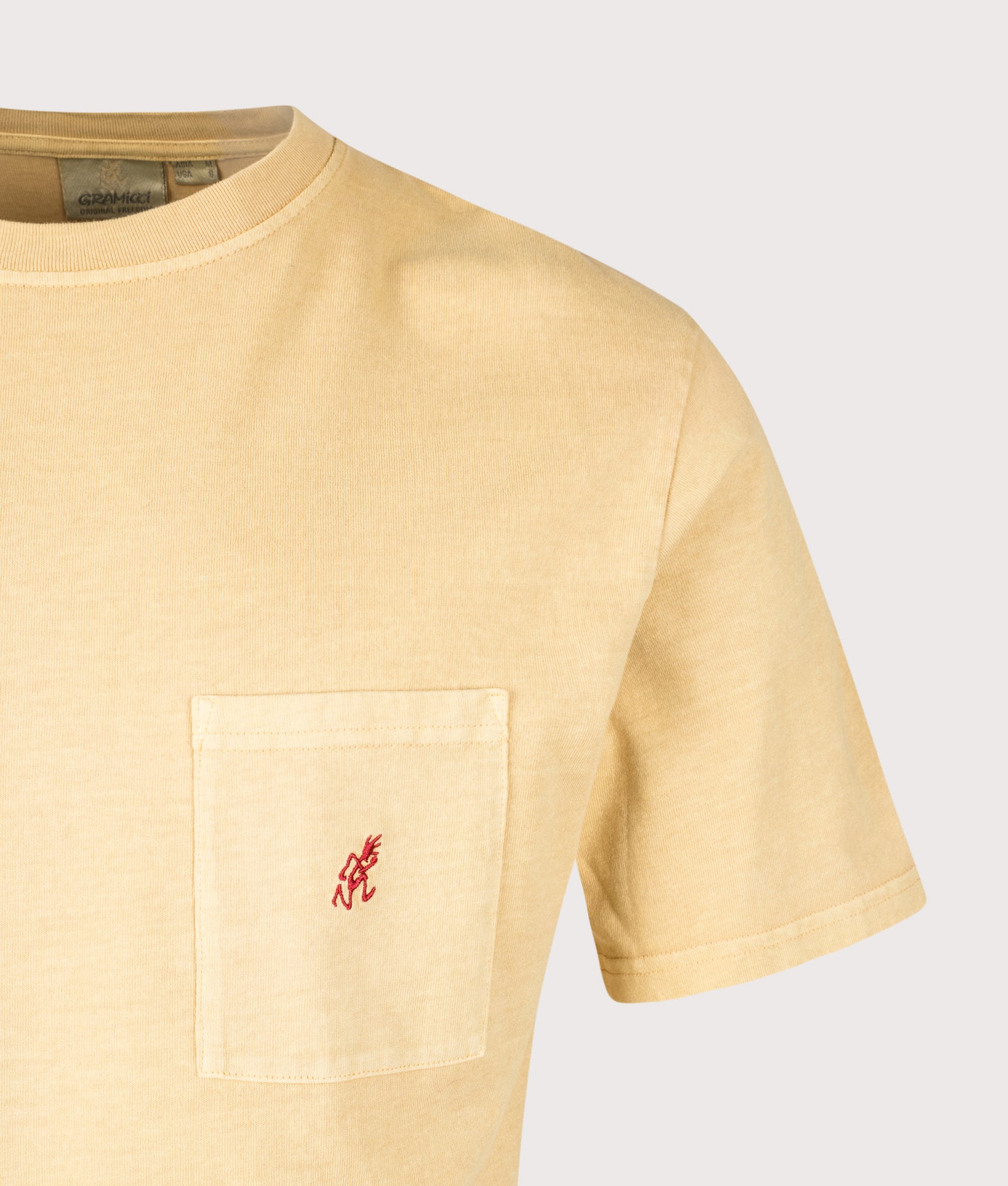 One Point Pigment Dyed T-Shirt in Mustard Pigment | 100% Cotton | Gramicci | EQVVS | Front detail shot 