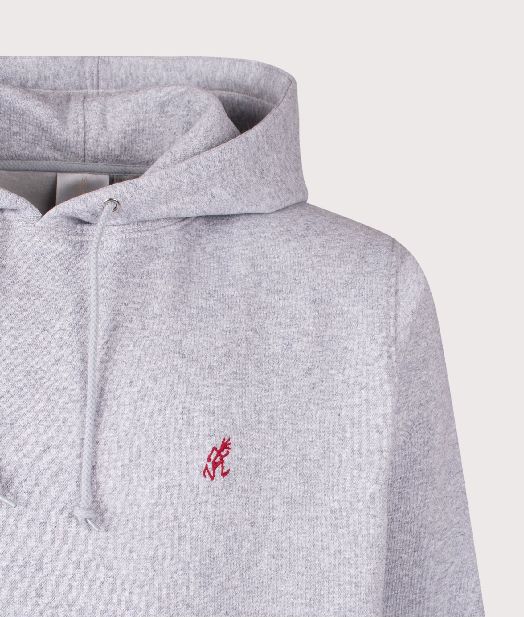 Gramicci One Point hoodie in Heather Grey at EQVVS Menswear. Detail shot.