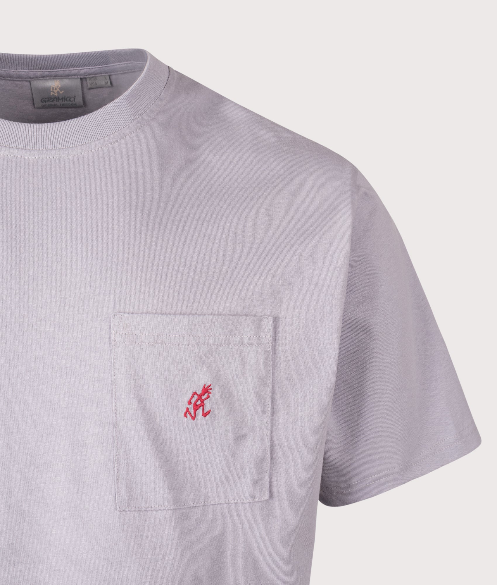 Gramicci One Point T-Shirt in Lavender at EQVVS Menswear. Detail shot.