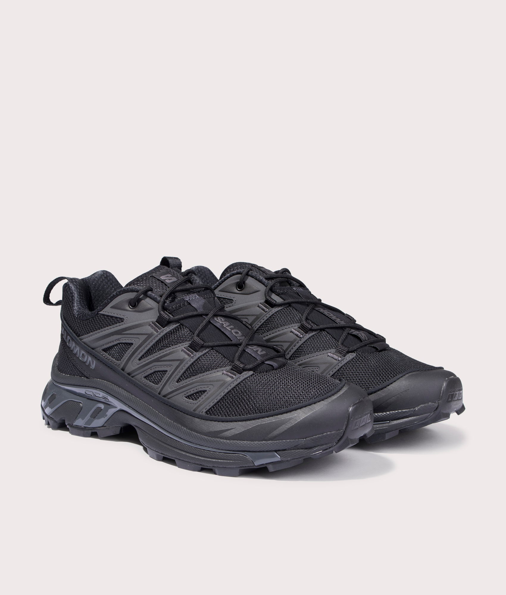 XT-6 Expanse Sneakers in Black/Ebony/Magnet | SALOMON | EQVVS | Front angle shot 