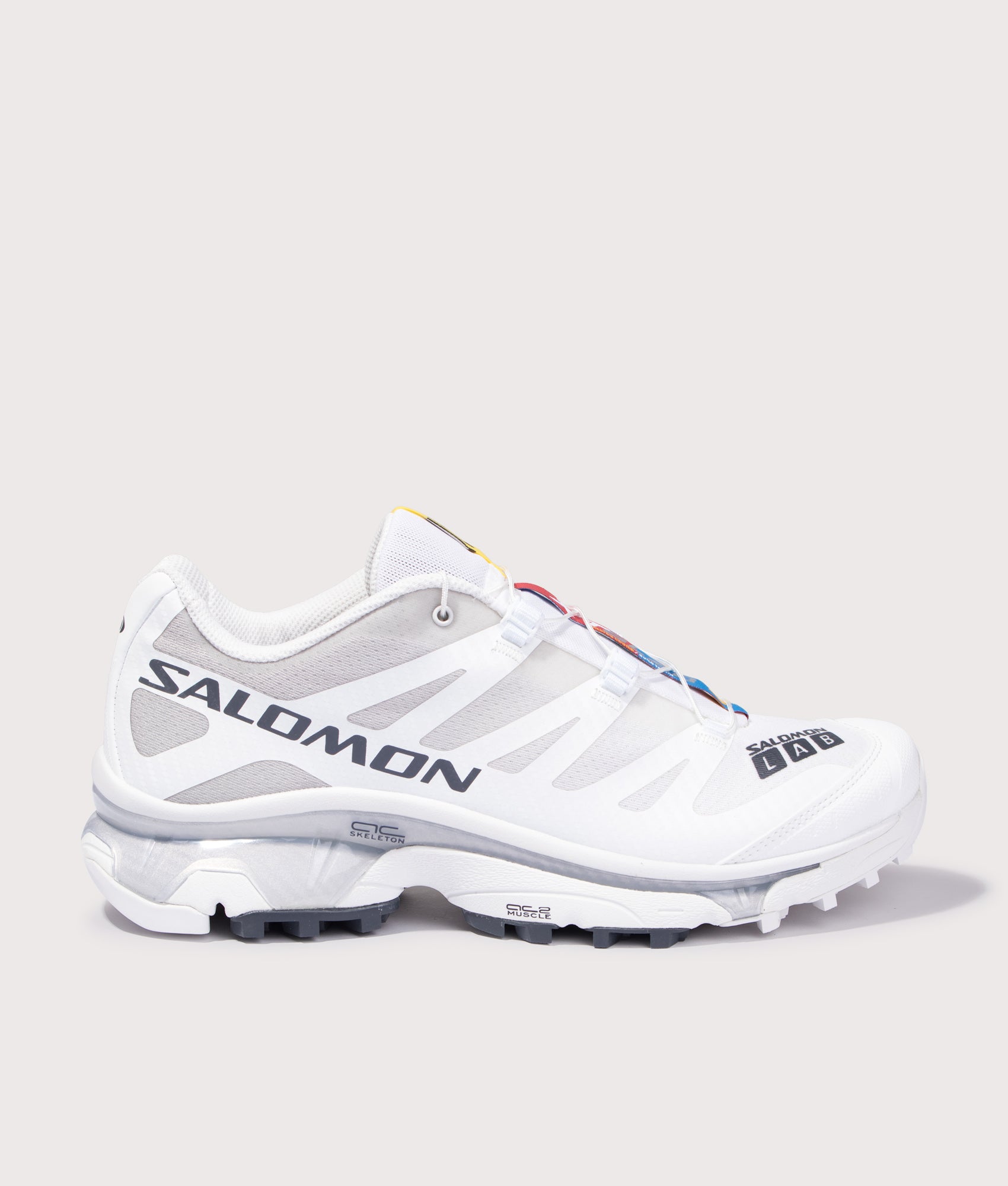SALOMON XT-4 OG Sneakers in White, Ebony and Lunar Rock at EQVVS Menswear. Side shot.