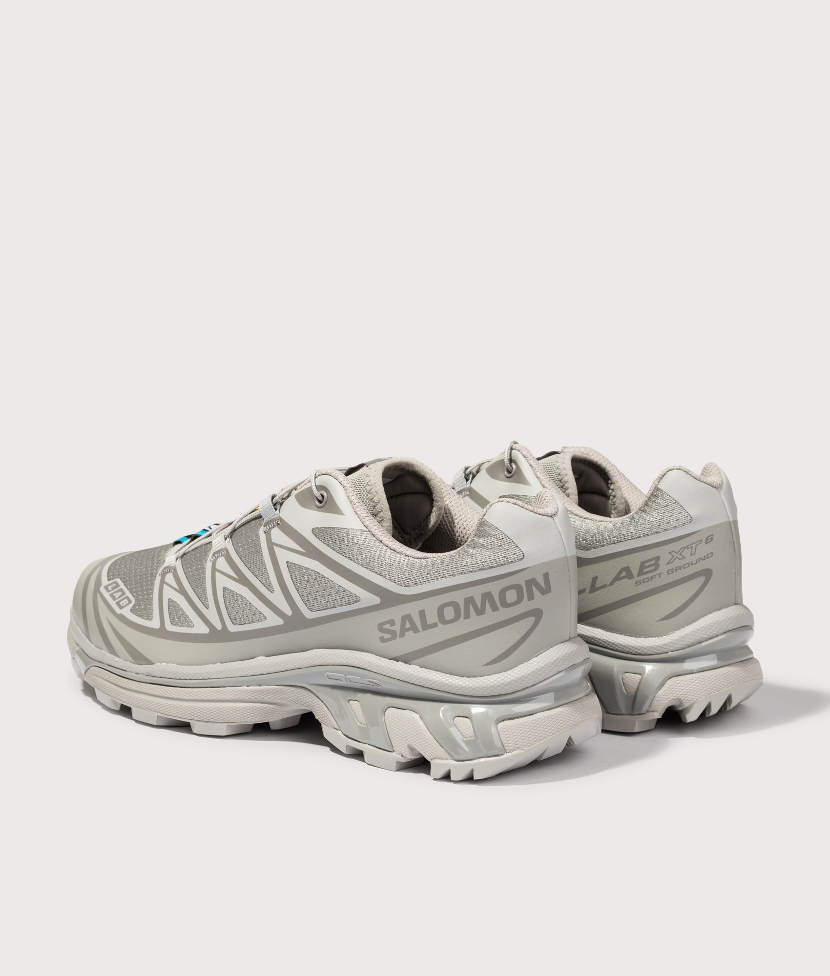 SALOMON XT-6 in Ghost Gray and Gray Flannel at EQVVS Menswear. Angled back shot.