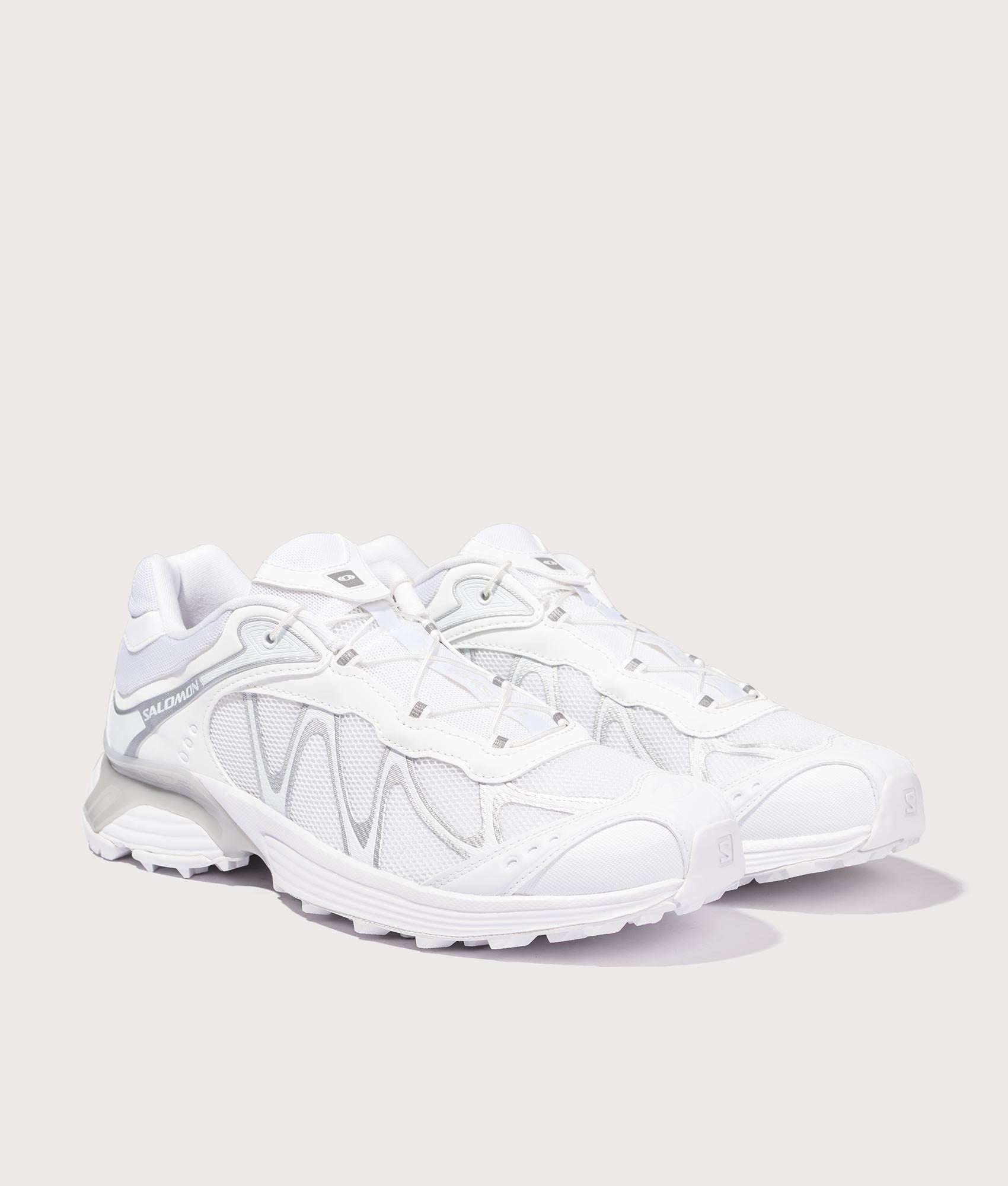 SALOMON XT-Whisper Sneakers in White/Lunar Rock/FTW Silver at EQVVS Menswear. Angled front shot.