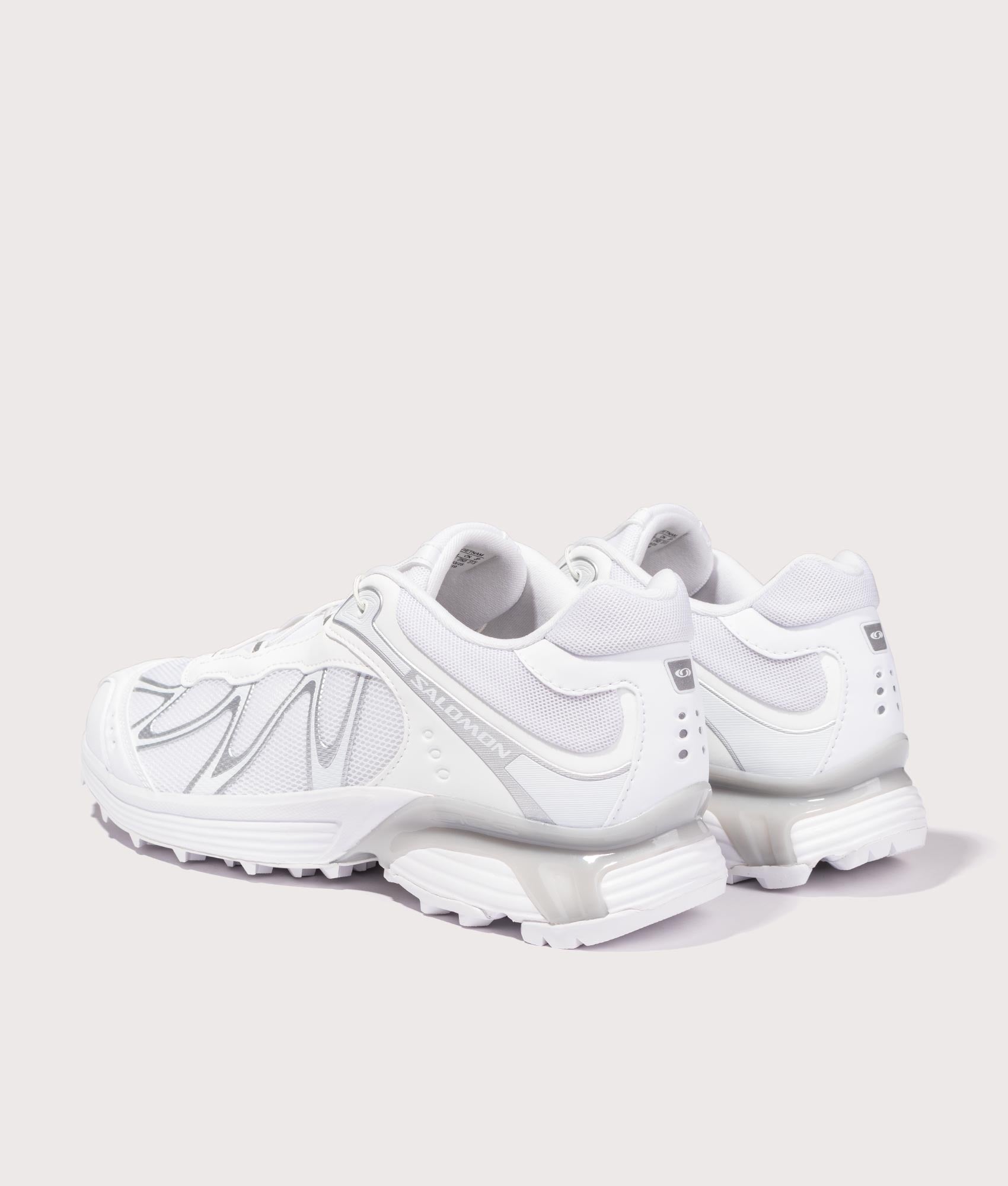 SALOMON XT-Whisper Sneakers in White/Lunar Rock/FTW Silver at EQVVS Menswear. Angled back shot.