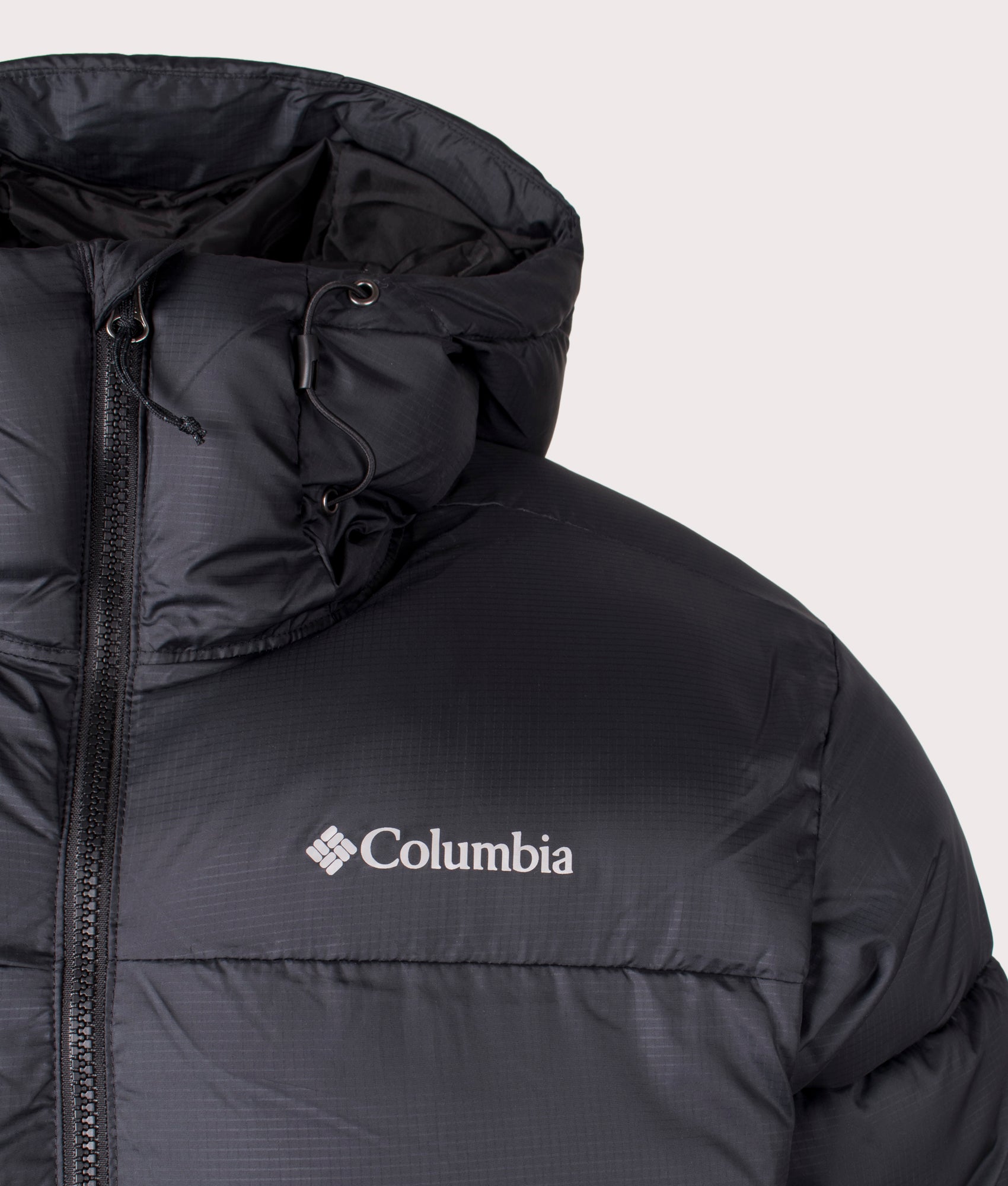 Columbia Puffect II Hooded Jacket in Black at EQVVS Menswear. Detail shot.
