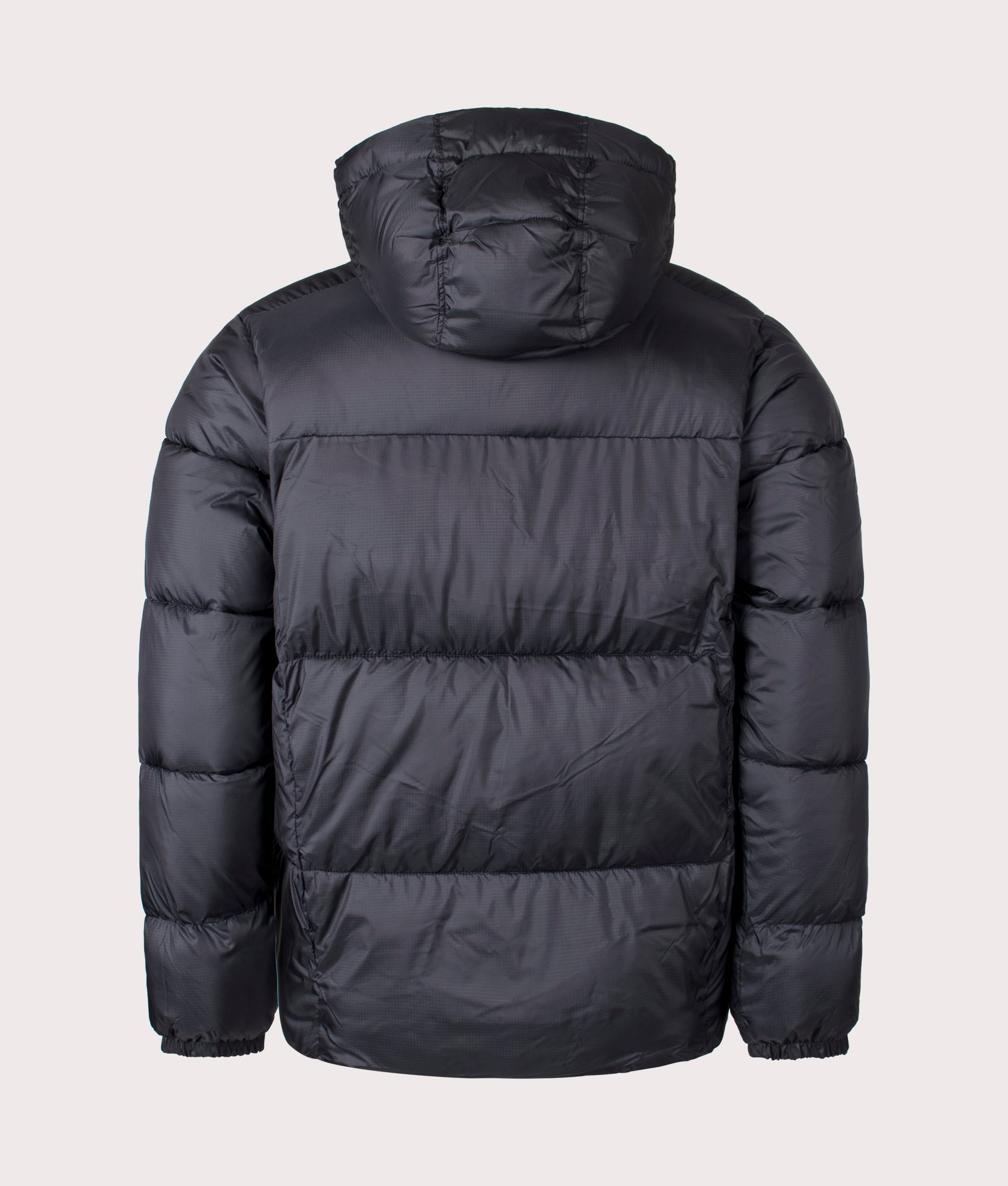 Columbia Puffect II Hooded Jacket in Black at EQVVS Menswear. Back shot.