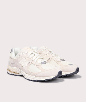New Balance 2002R Sneakers in Calm Taupe. Side angle shot at EQVVS.