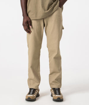 Dickies Duck Carpenter Pants in Stone Washed Desert Sand. Front angle shot at EQVVS.