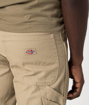 Dickies Duck Carpenter Pants in Stone Washed Desert Sand. Detail shot at EQVVS.