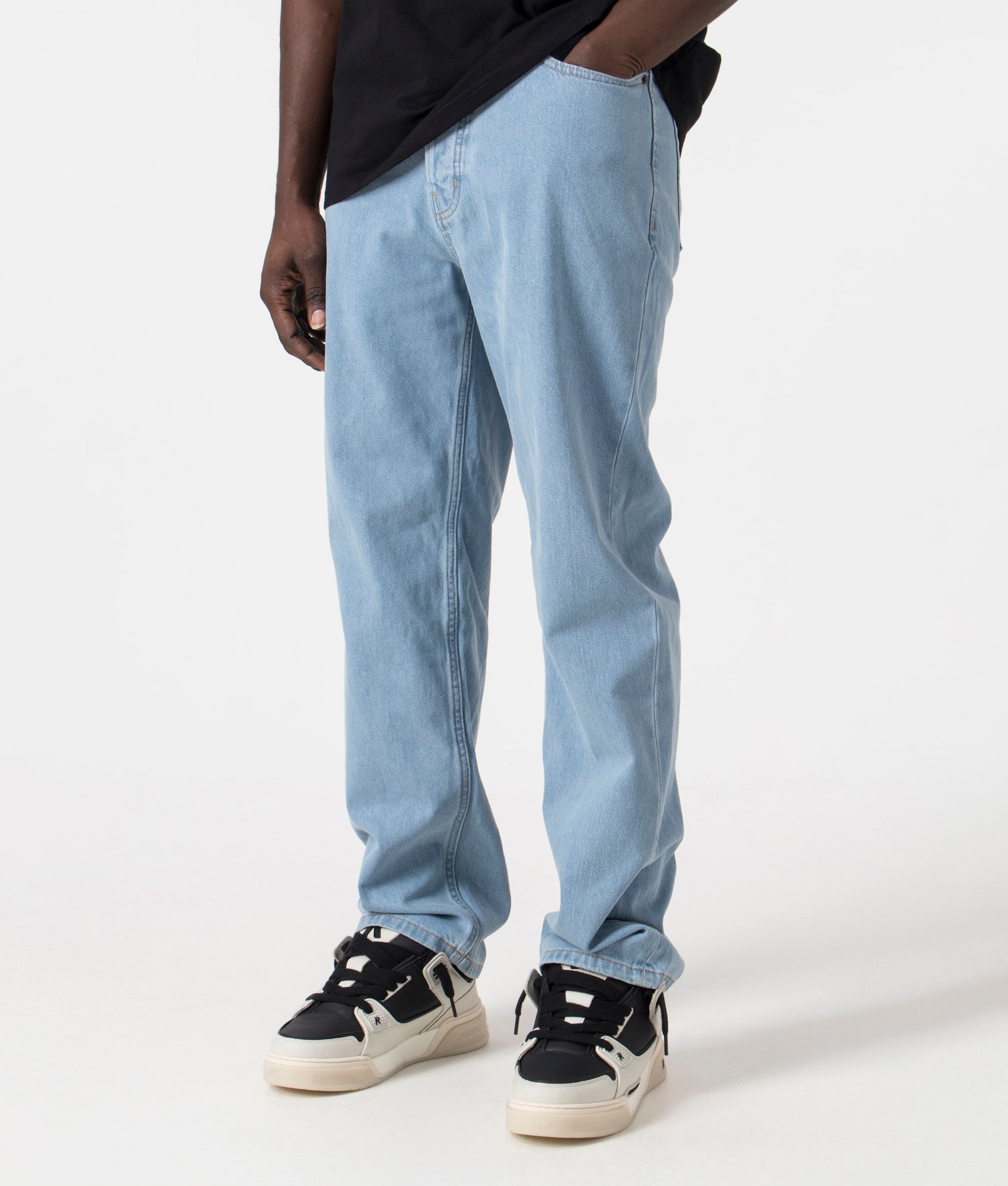 Dickies Thomasville Jeans in Vintage Blue. Front side angle shot at EQVVS.
