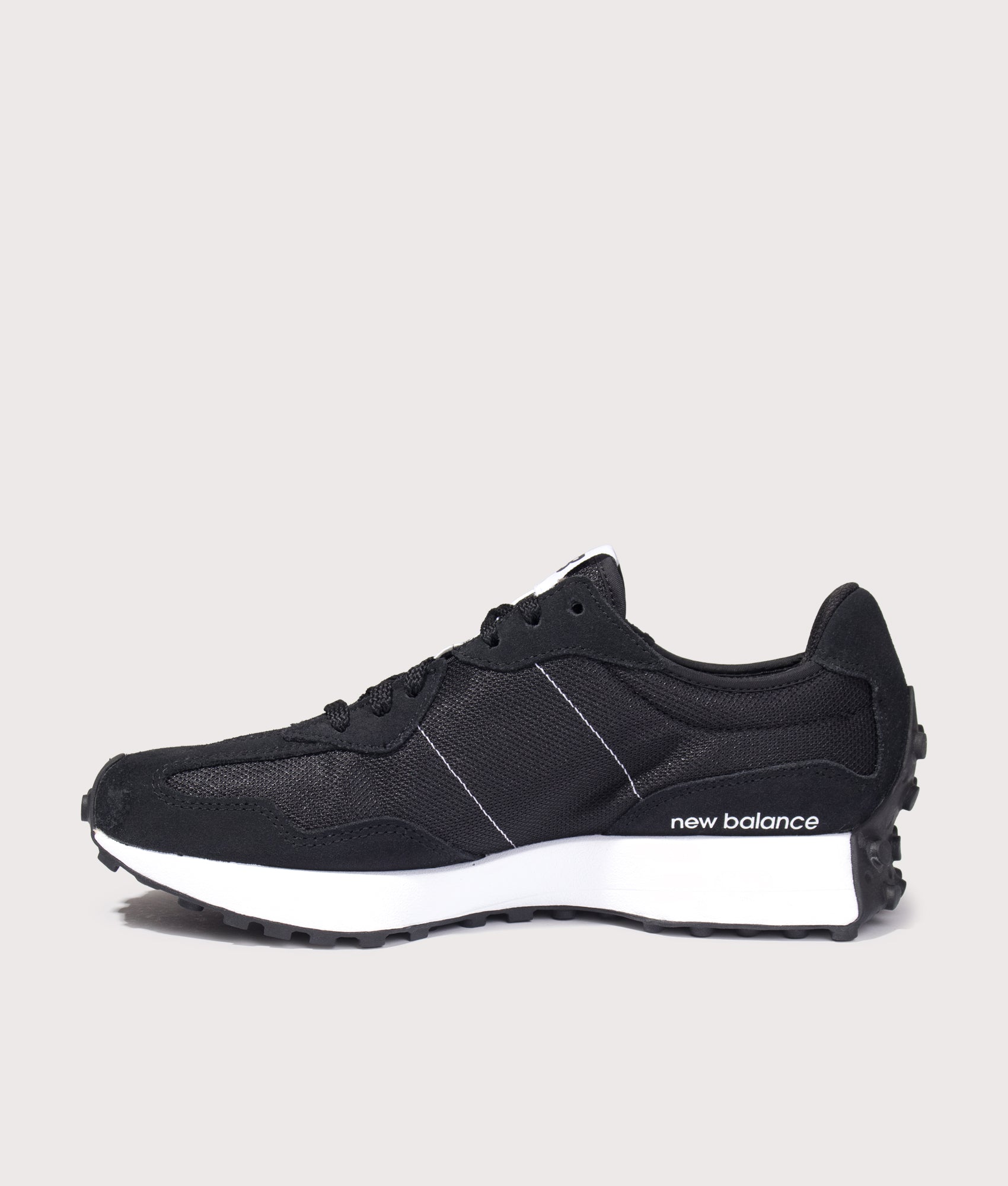 New Balance 327 Sneakers in Black at EQVVS Menswear. Inside shot.