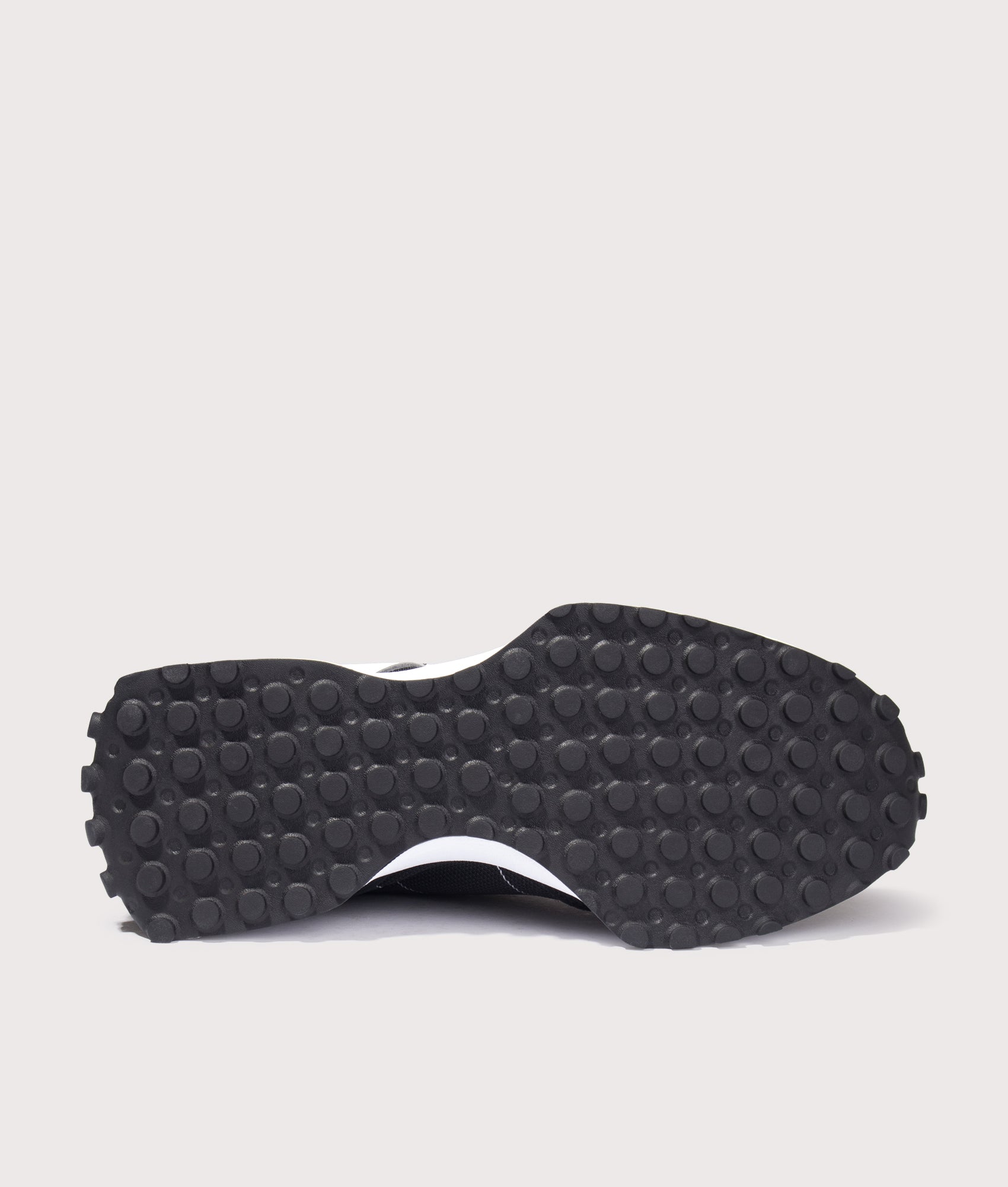 New Balance 327 Sneakers in Black at EQVVS Menswear. Tread shot.