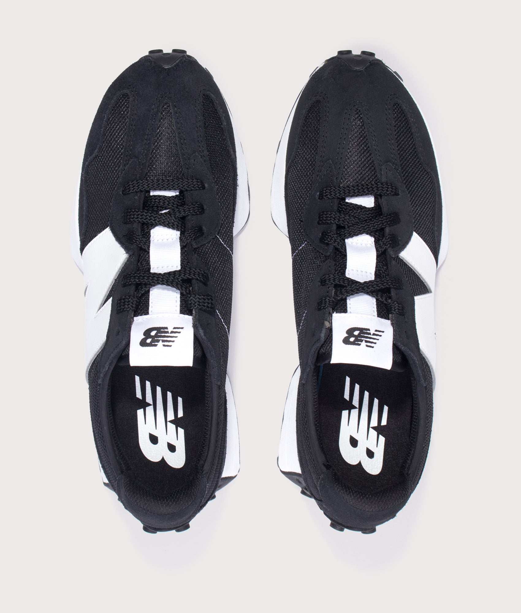 New Balance 327 Sneakers in Black at EQVVS Menswear. Top shot.