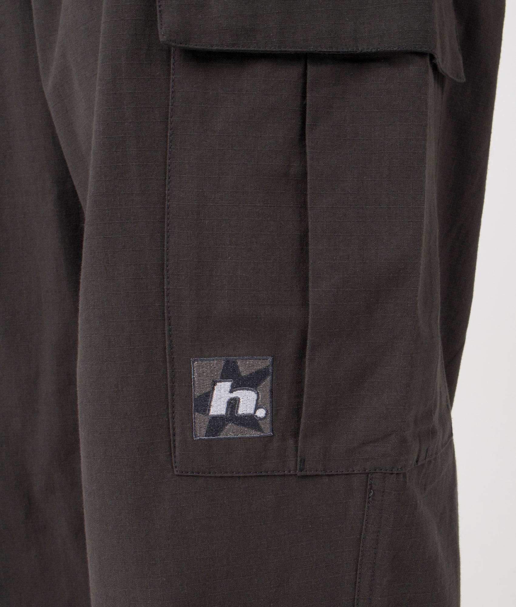 Huf Relaxed Fit Huf Leisure Cargo Pants in Black at EQVVS Menswear detail shot
