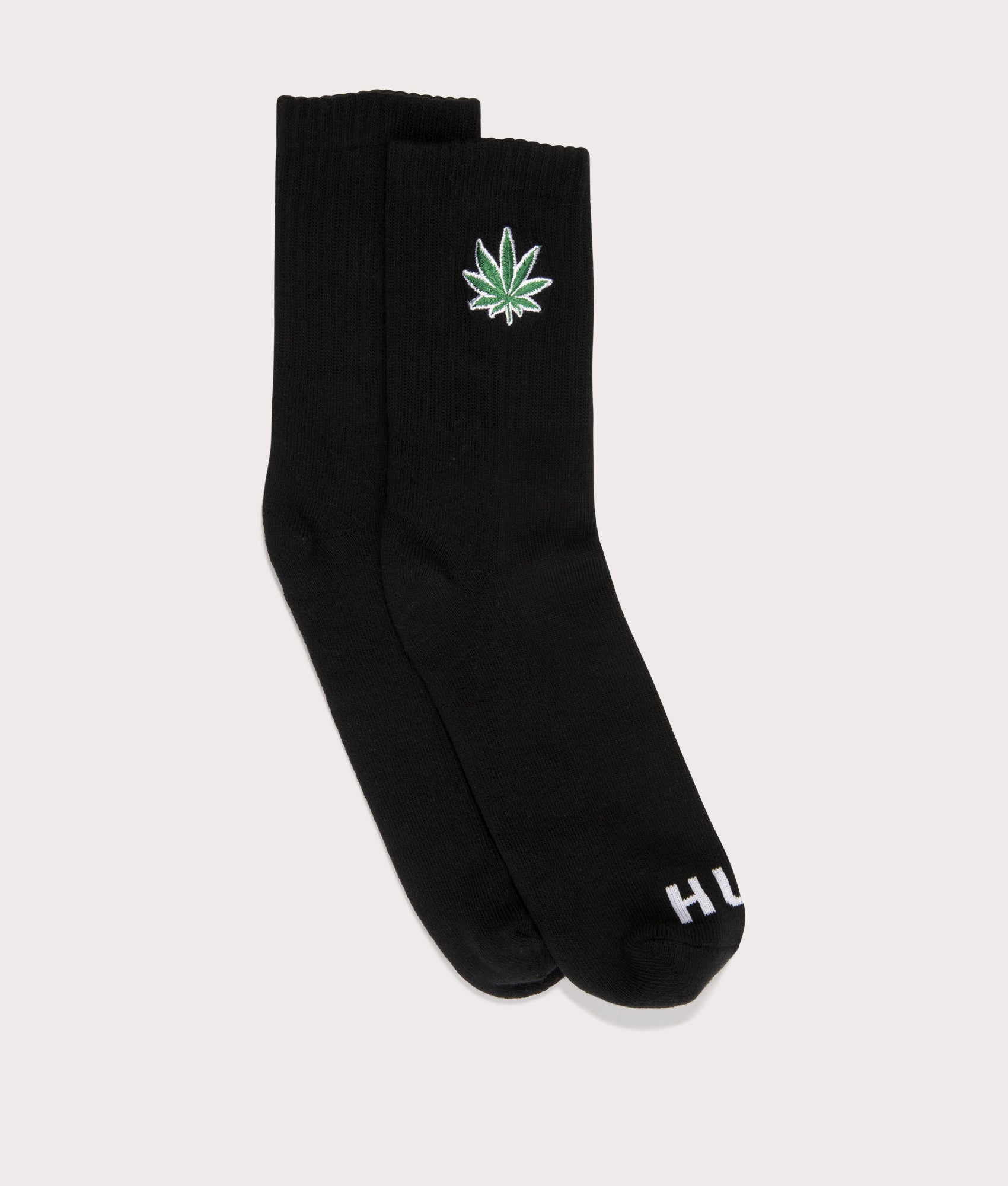 HUF Plantlife Emb Socks in Black. Shot at EQVVS.  Side shot 