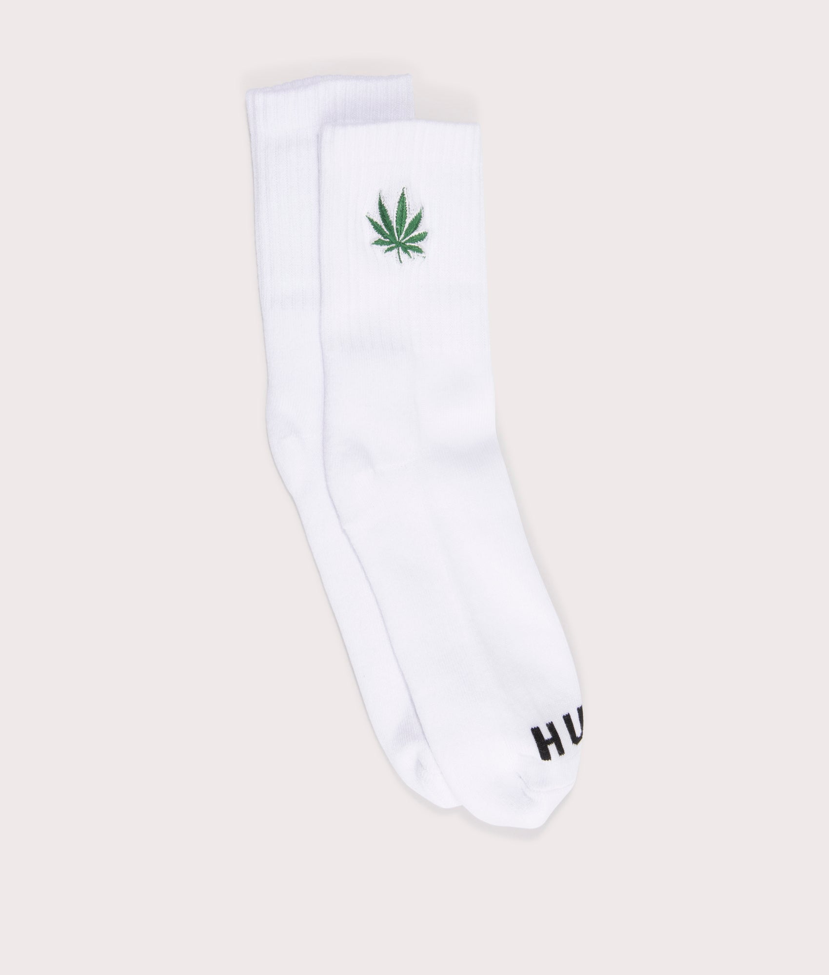 HUF Plantlife Emb Socks in White. Shot at EQVVS.  Front shot 
