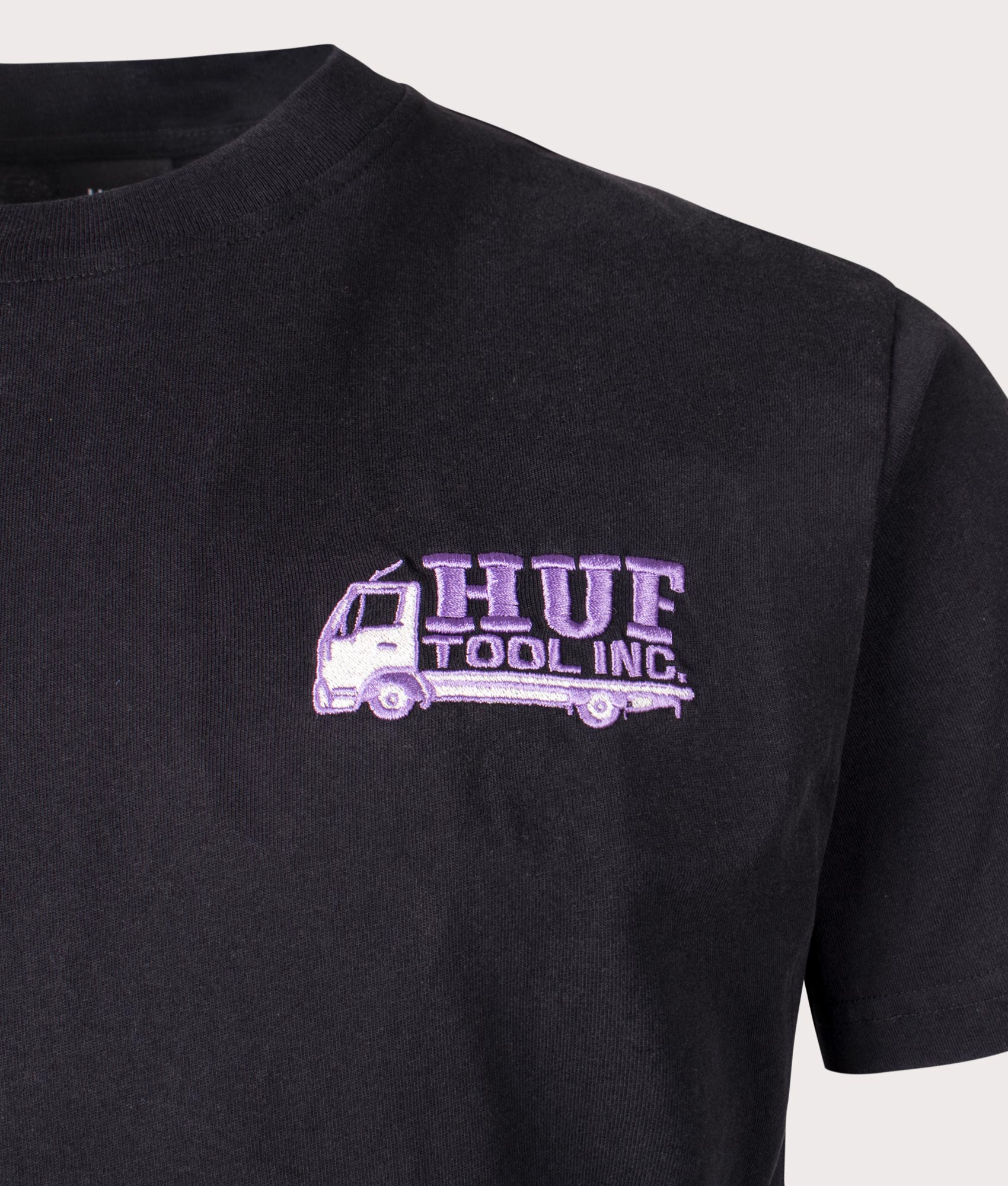 HUF Tool Inc Washed T-Shirt in Black. Shot at EQVVS.  Front logo shot 