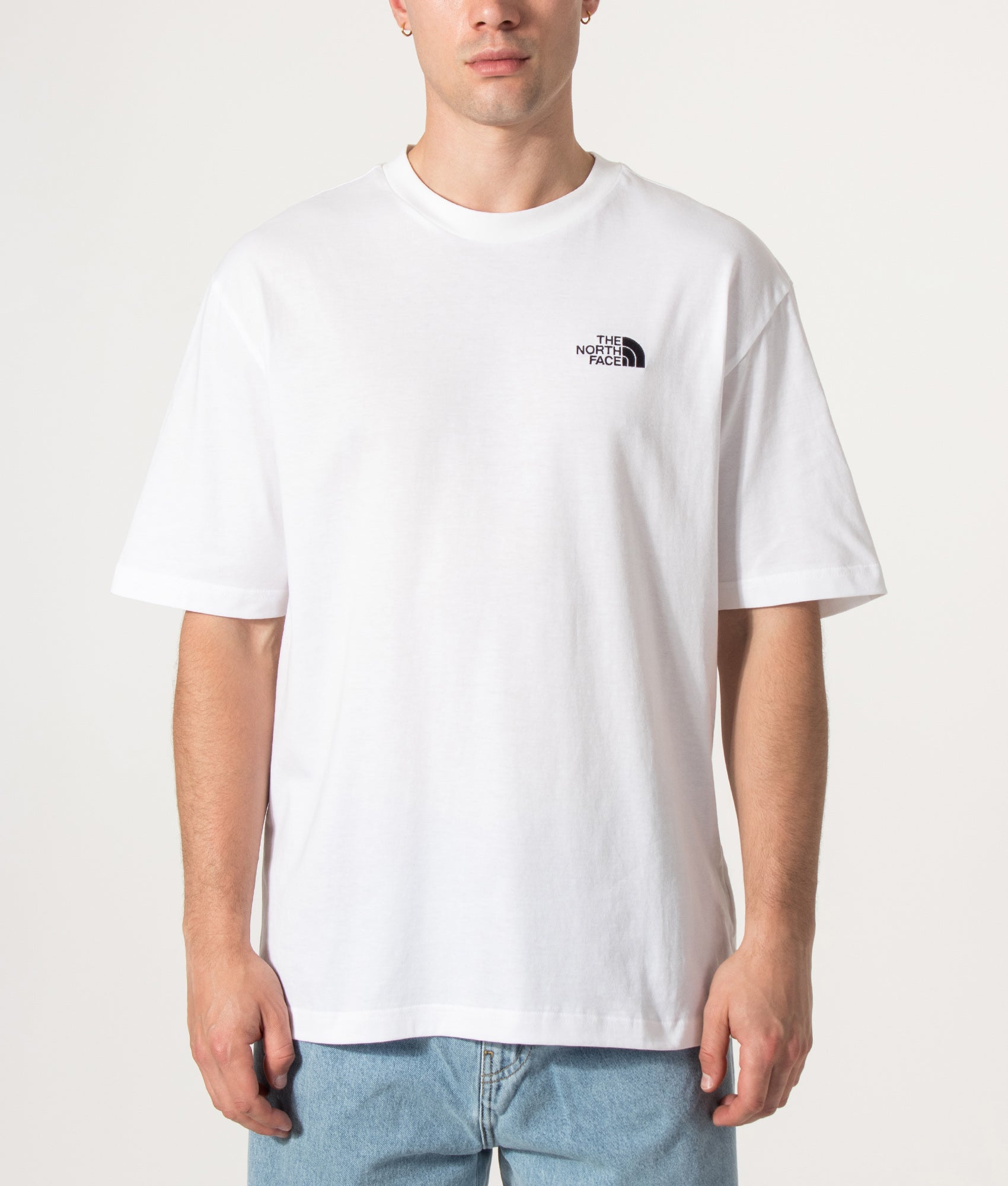 The North Face Essential Oversized T-Shirt in TNF White at EQVVS Menswear. Model front shot.