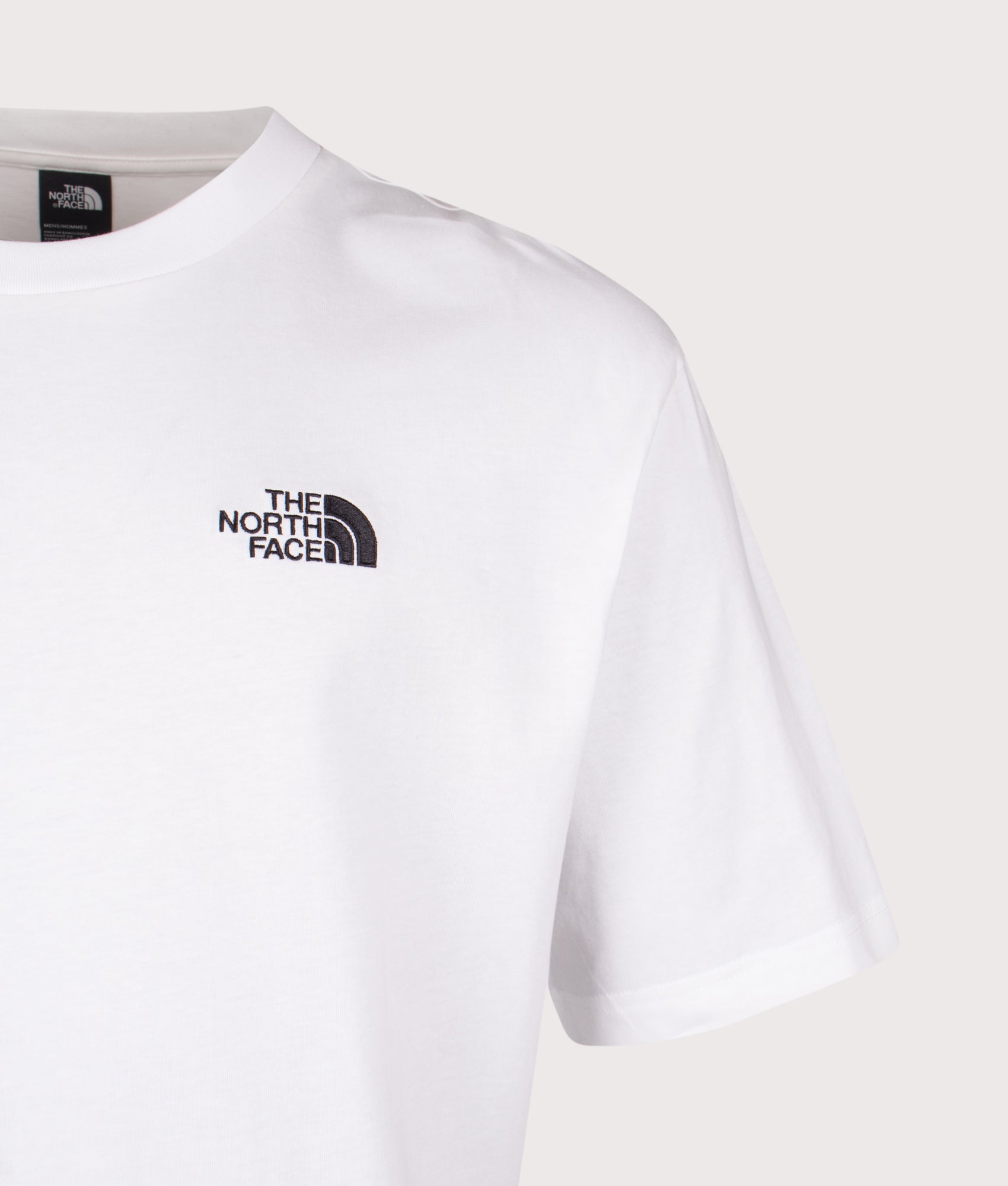The North Face Essential Oversized T-Shirt in TNF White at EQVVS Menswear. Detail shot.