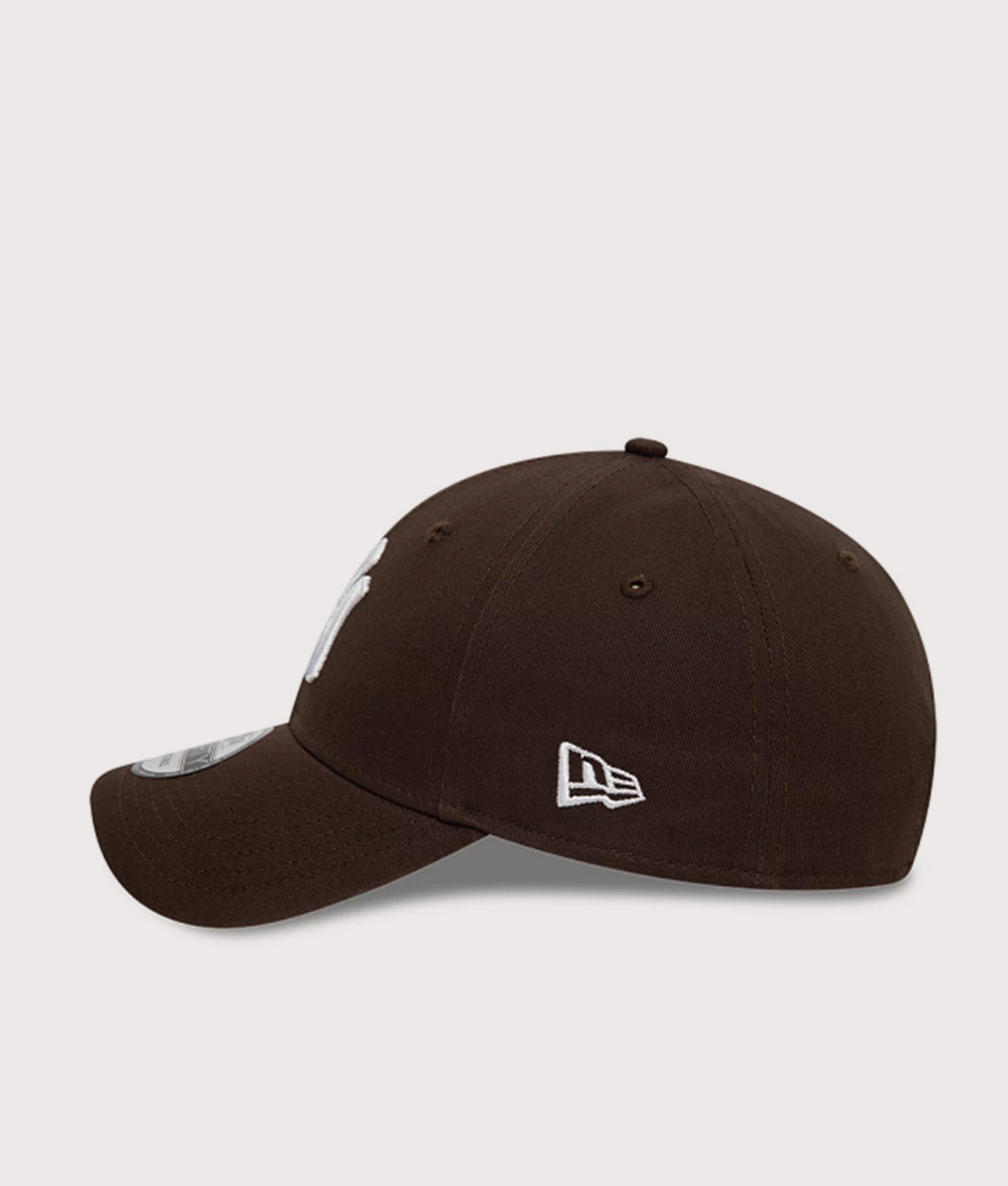 New Era New York Yankees League Essential 9FORTY Cap in Dark Brown at EQVVS Menswear. Side shot.