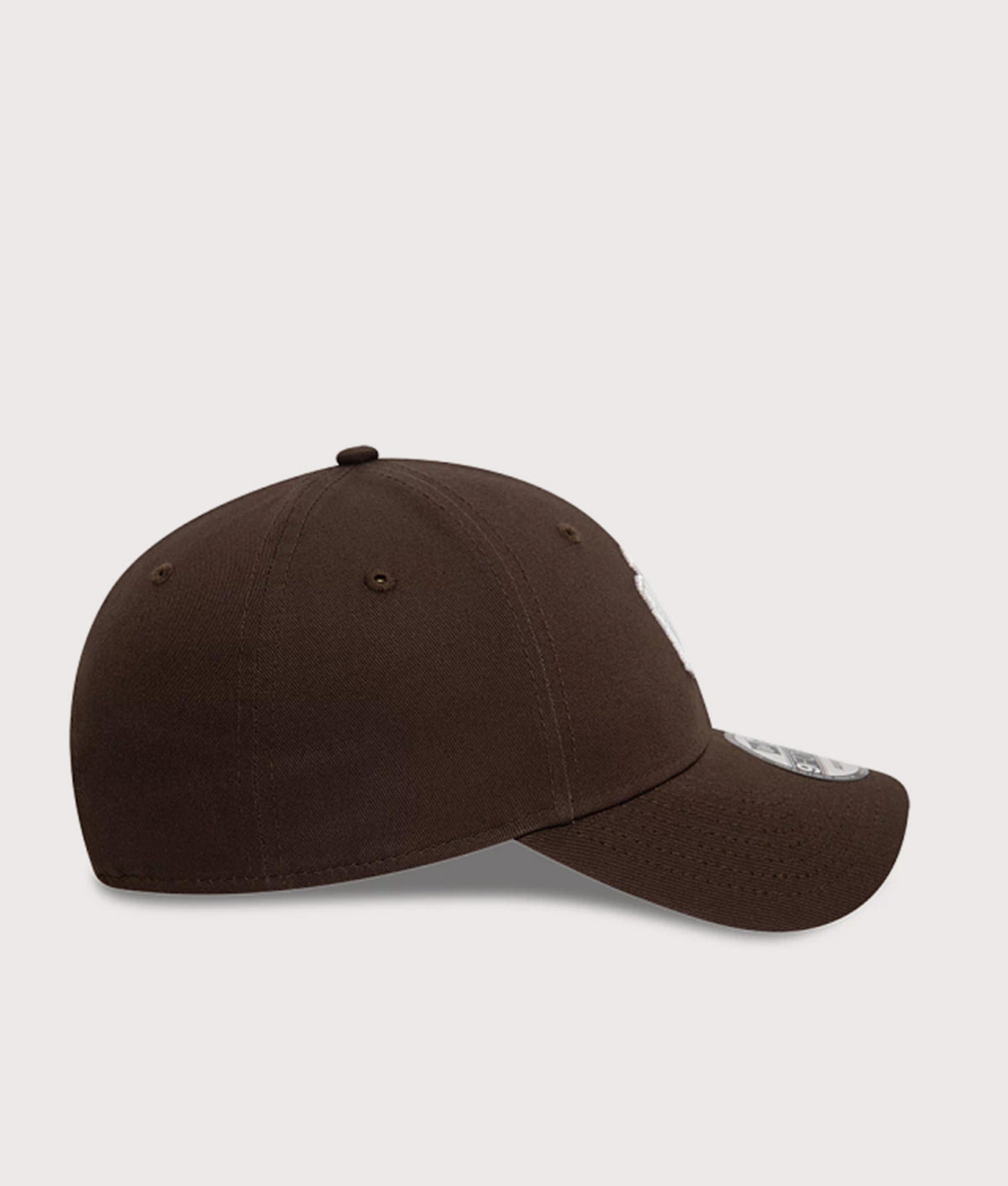 New Era New York Yankees League Essential 9FORTY Cap in Dark Brown at EQVVS Menswear. Side shot.