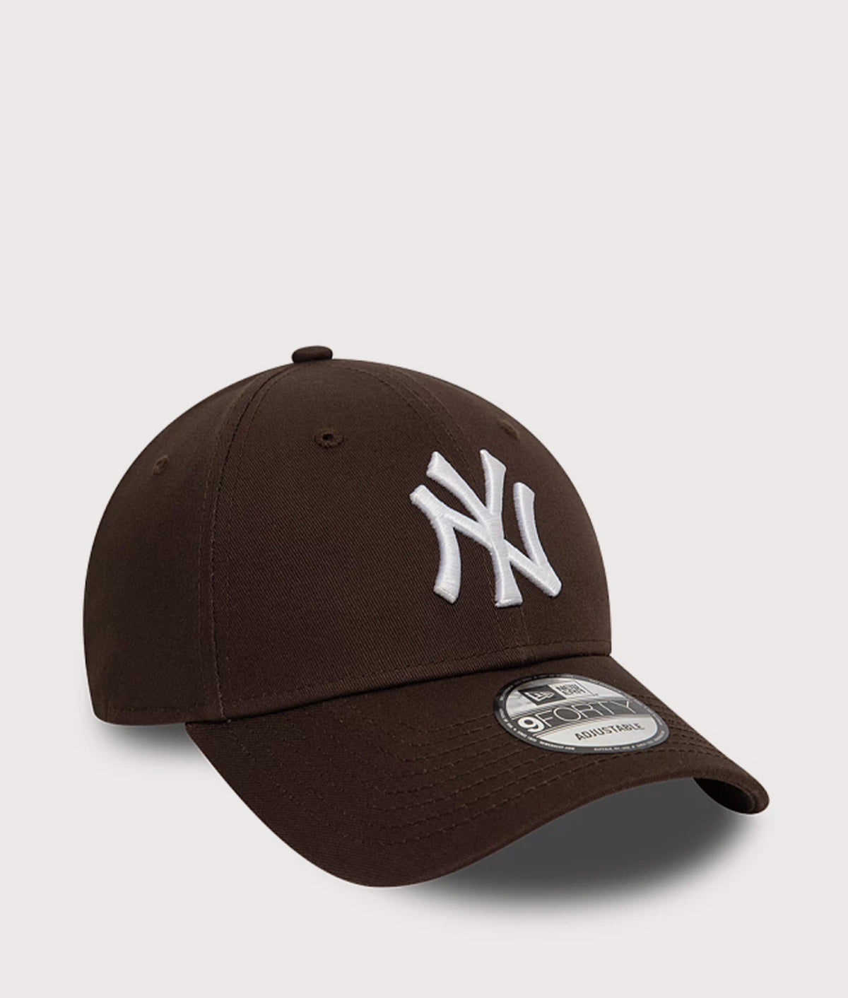 New Era New York Yankees League Essential 9FORTY Cap in Dark Brown at EQVVS Menswear. Angled front shot.