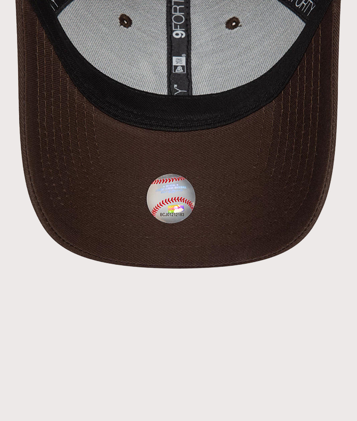 New Era New York Yankees League Essential 9FORTY Cap in Dark Brown at EQVVS Menswear. Peak shot.