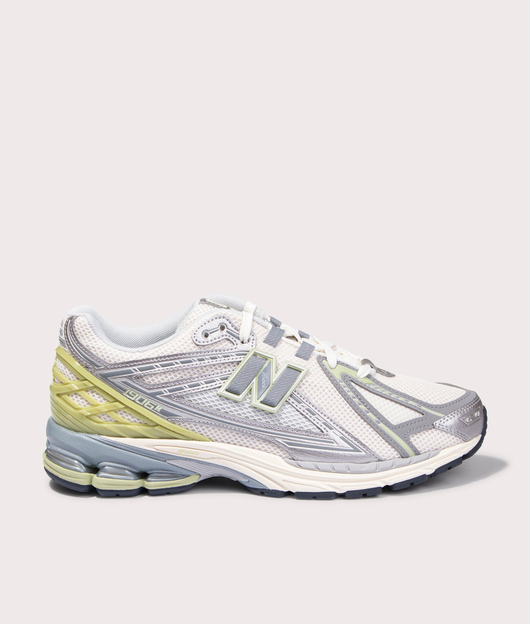 New Balance 1906R Sneakers in Sea Salt. Side angle shot at EQVVS.