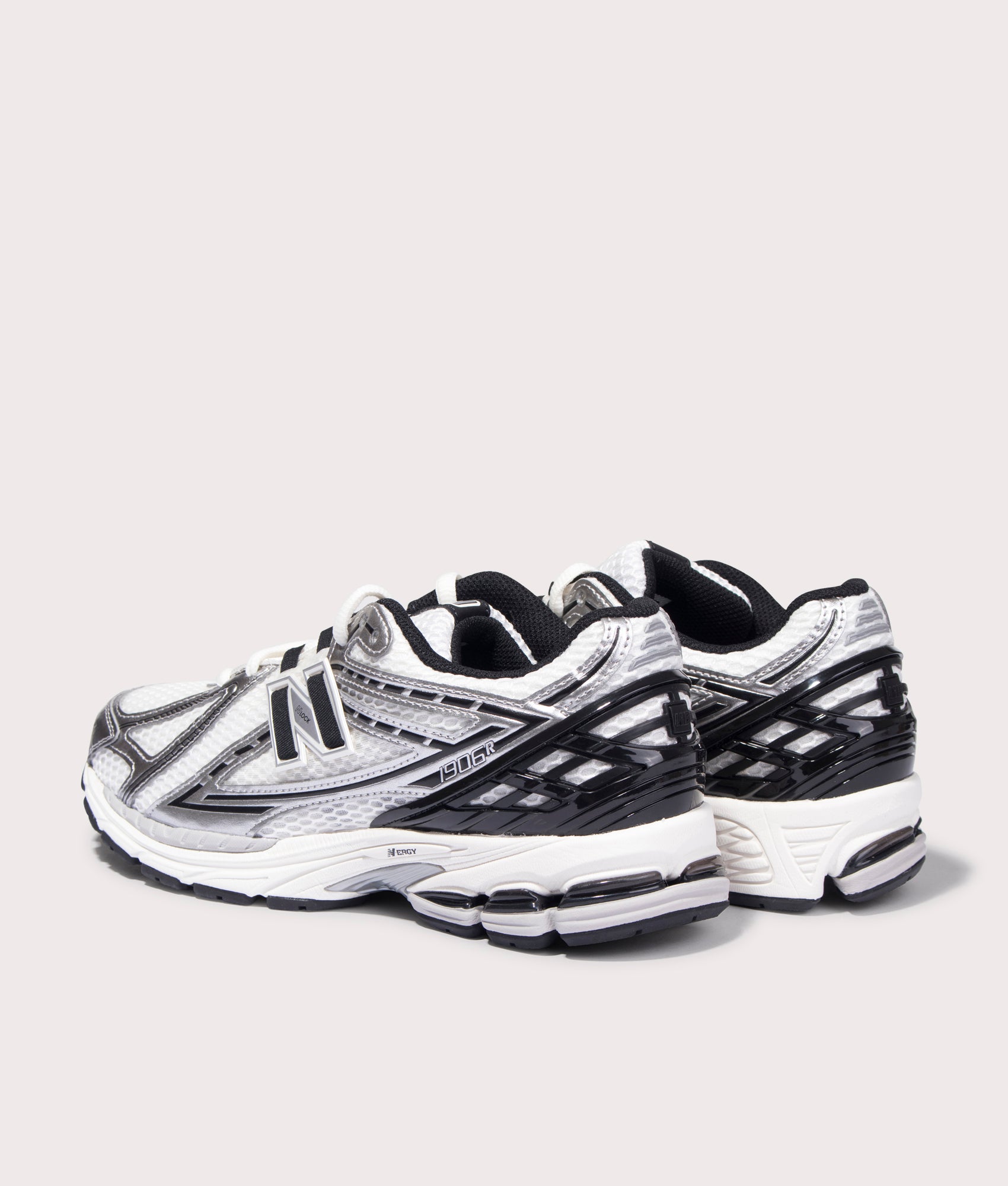 New Balance 1906R Sneakers in Silver Metallic. Back angle shot at EQVVS.