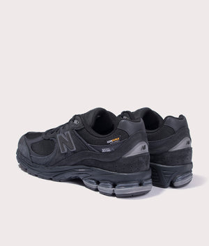New Balance 2002R Sneakers in Phantom. Suede and Textile Upper. At EQVVS Menswear. Back left angle shot