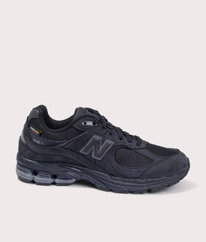 New Balance 2002R Sneakers in Phantom, Suede and Textile Upper. At EQVVS Menswear. Side detail shot