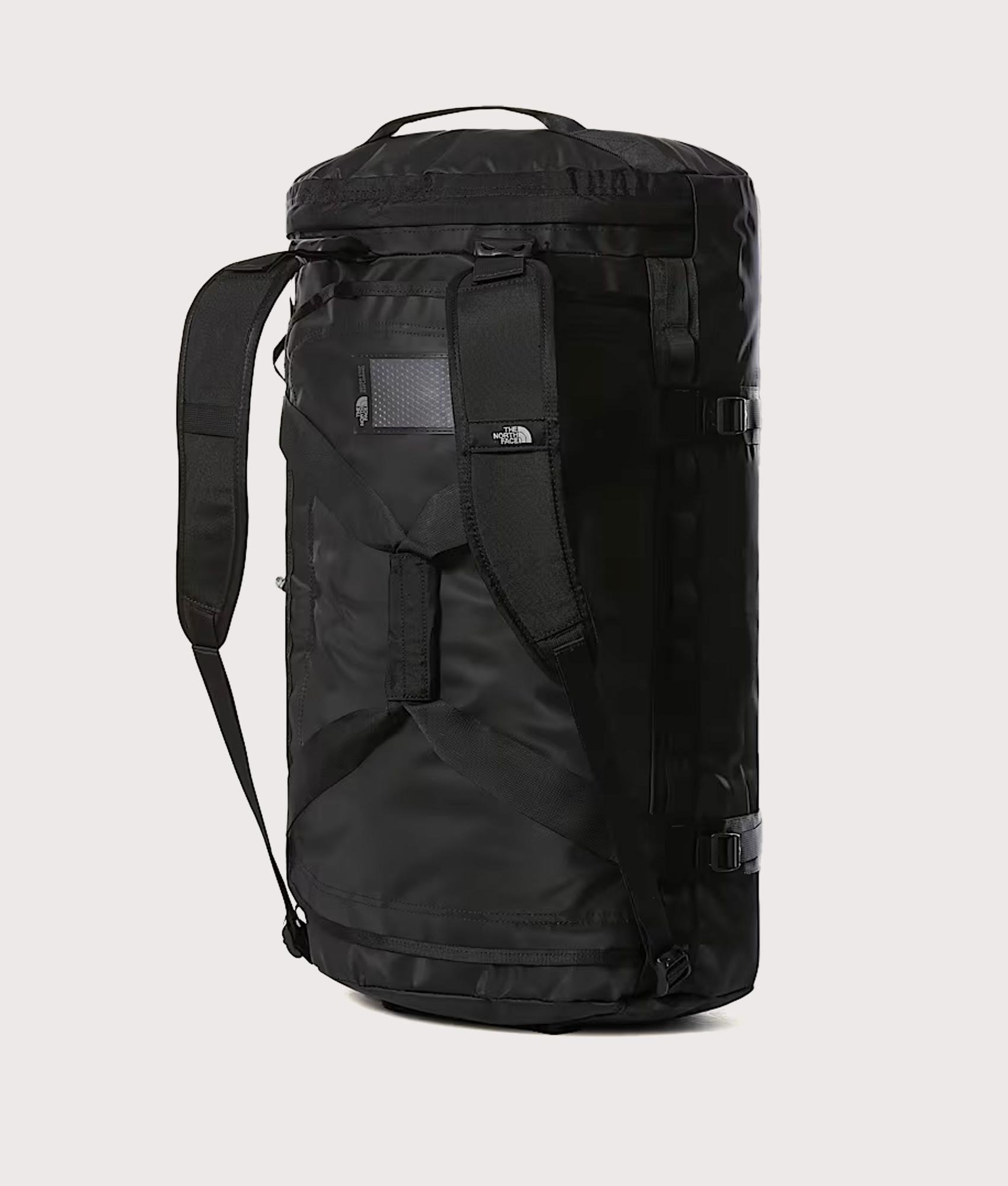 The North Face Large Base Camp Duffel Bag in TNF Black and TNF White at EQVVS Menswear. Back shot.