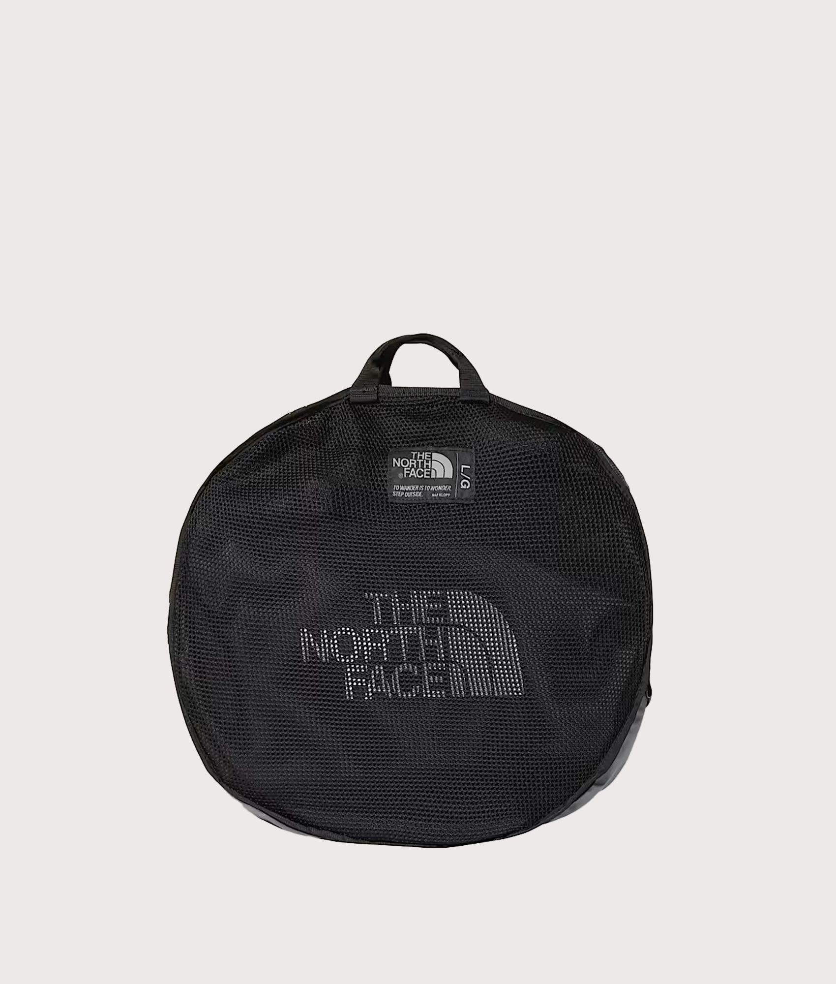 The North Face Large Base Camp Duffel Bag in TNF Black and TNF White at EQVVS Menswear. Detail shot.