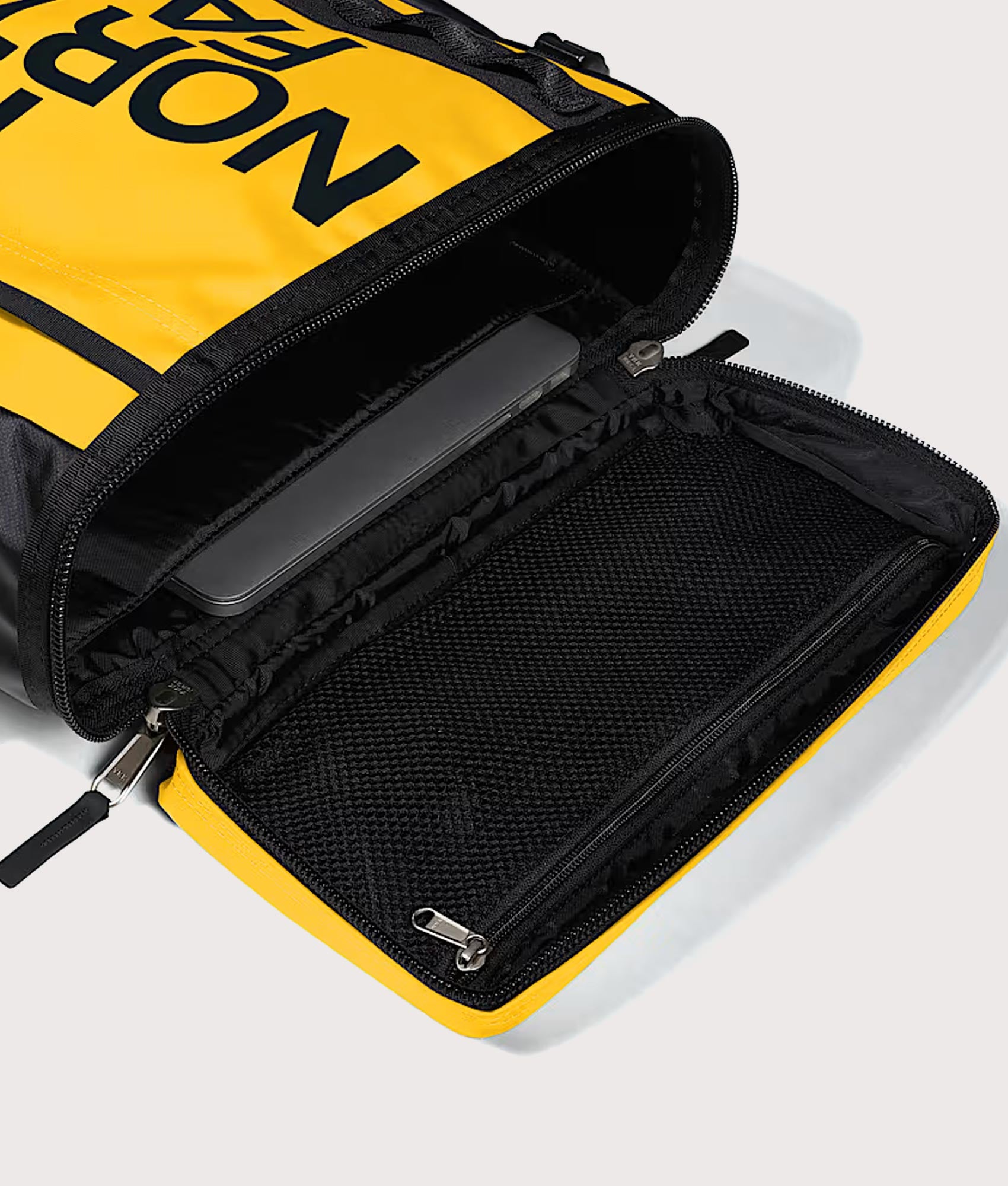 The North Face Fuse Box Backpack in  Summit Gold and TNF Black at EQVVS Menswear. Open shot.