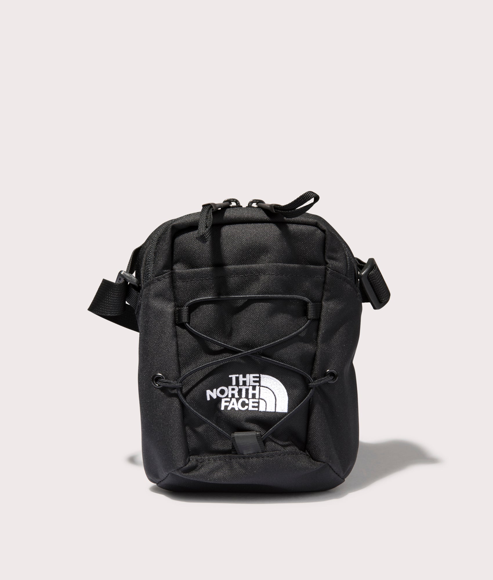 The North Face Jester Crossbody Bag in Black at EQVVS. Front Shot.